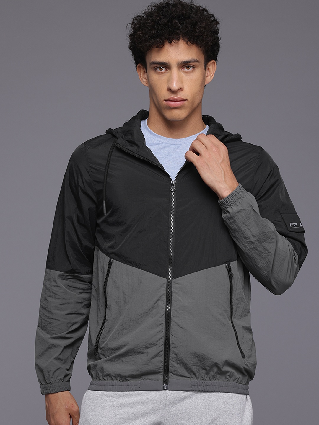 

HRX by Hrithik Roshan Men Colourblocked Windcheater Sporty Jacket, Grey