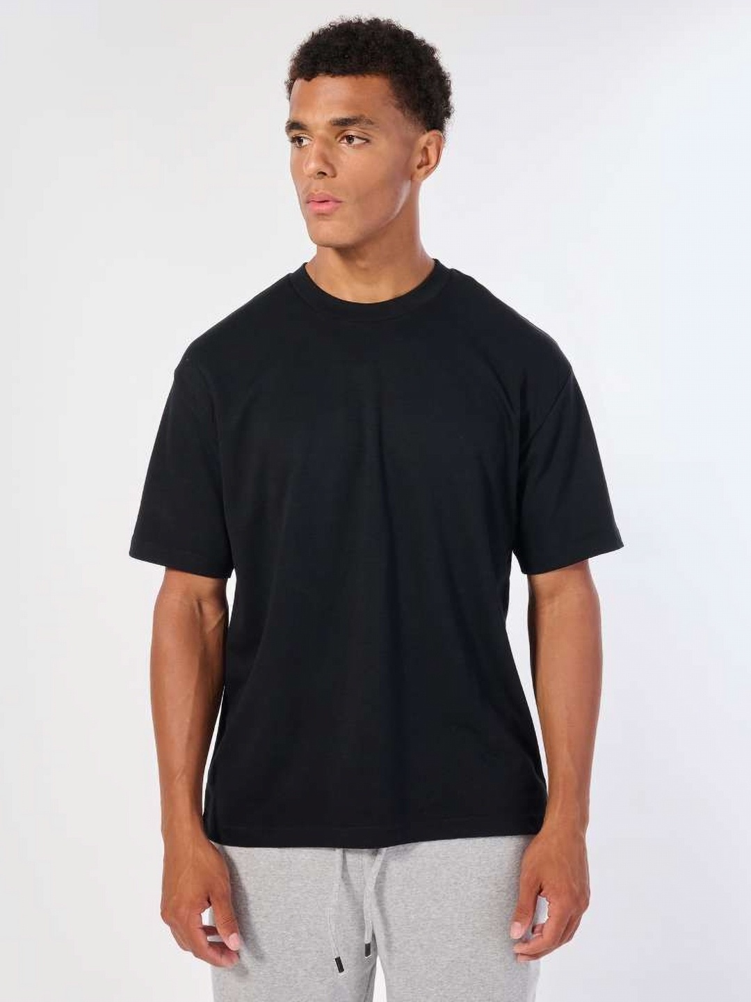 

CELSIUS Men Solid Moisture Wicking Relaxed Fit T-shirt, Black