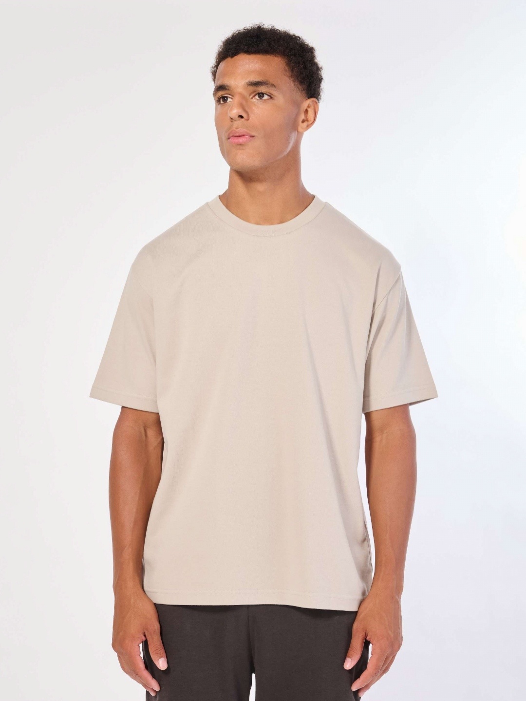 

CELSIUS Men Solid Moisture Wicking Relaxed Fit T-shirt, Beige