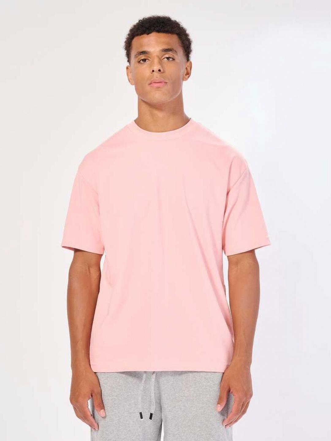 

CELSIUS Men Solid Moisture Wicking Oversized T-shirt, Pink