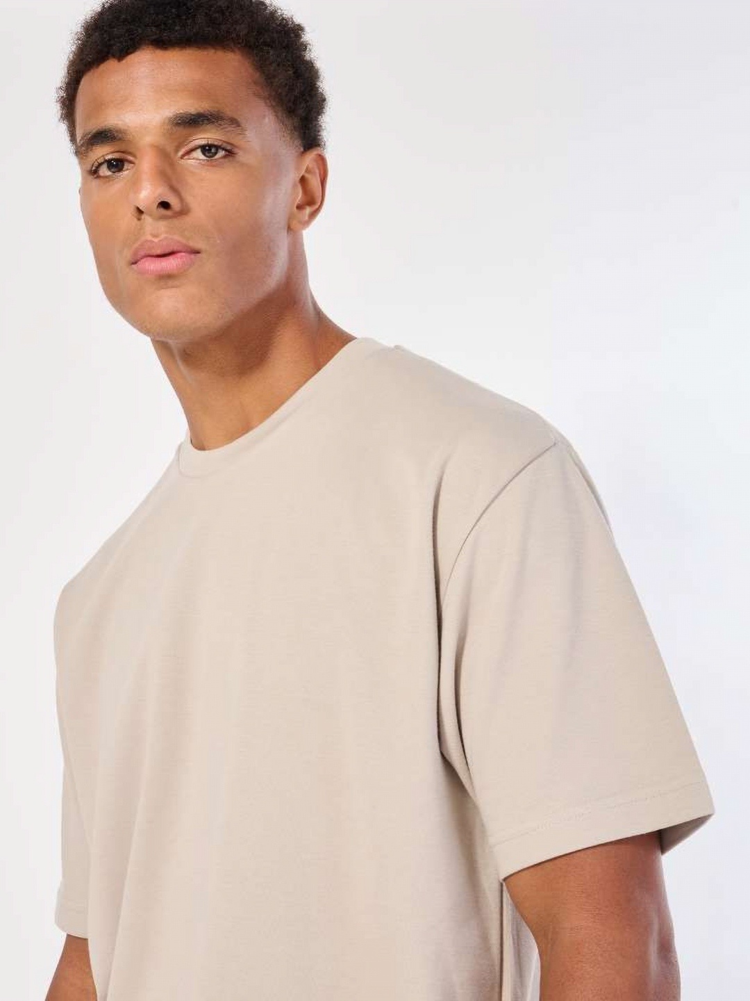 

CELSIUS Men Solid Moisture Wicking Relaxed Fit T-shirt, Beige