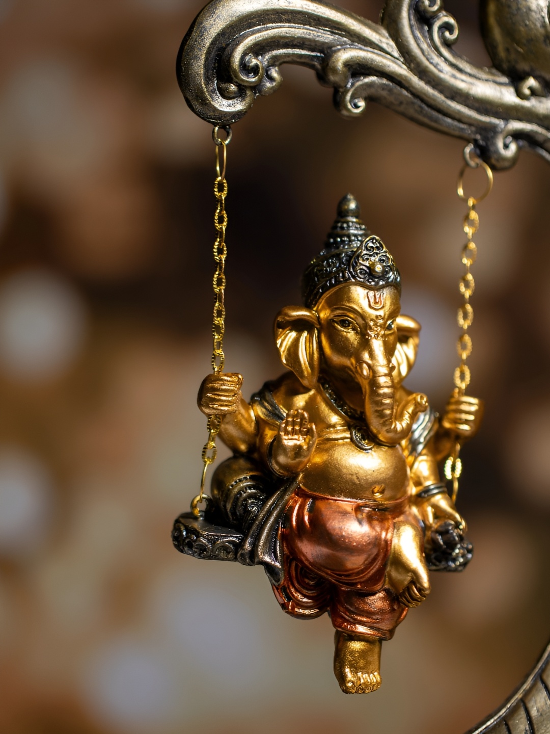 

TYOOHAR Gold-Toned & Bronze Lord Ganesha Religious Idol Showpiece