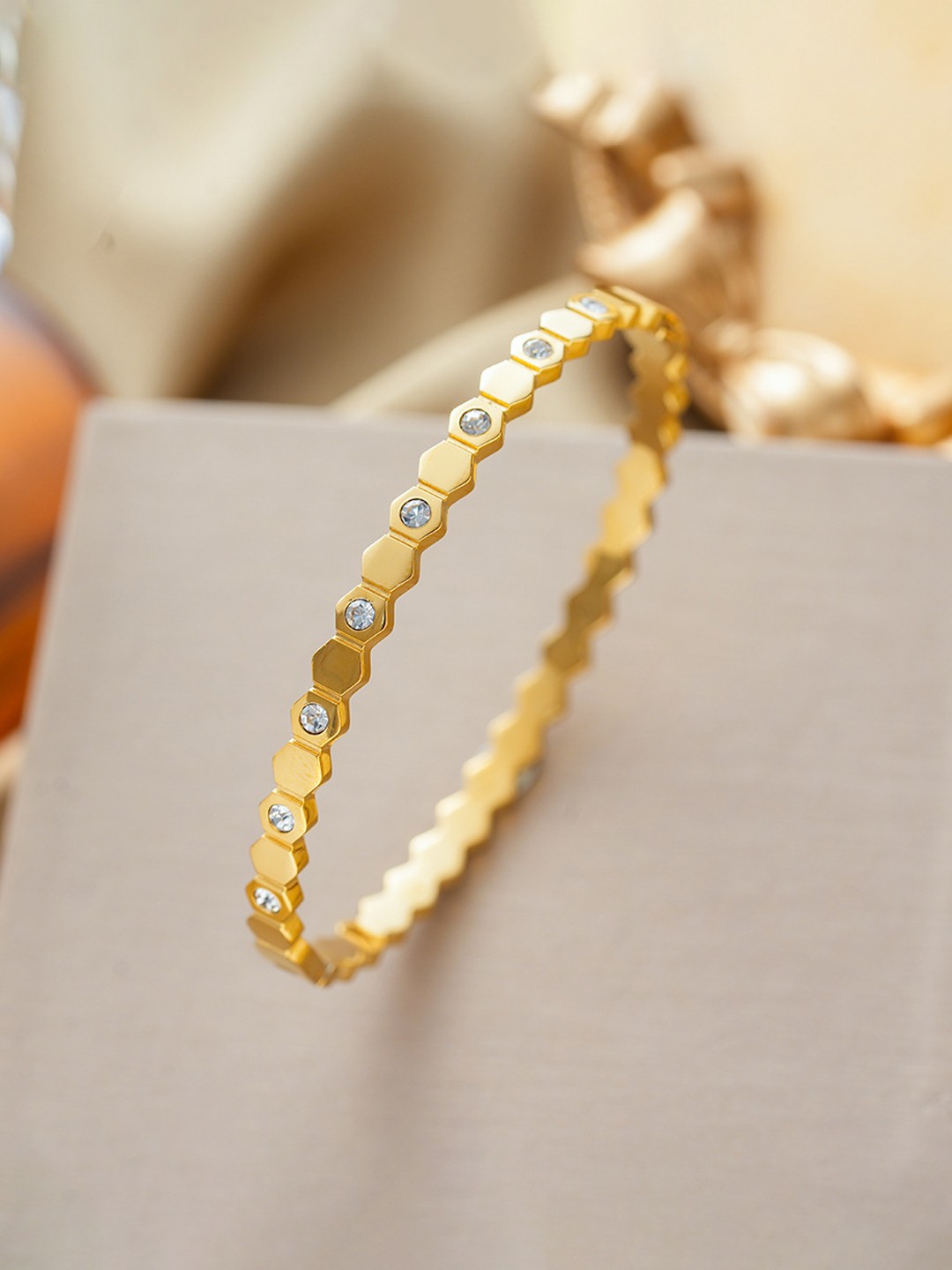 

Designs & You Gold-Plated American Diamond Studded Anti Tarnish Bangle-Style Bracelet