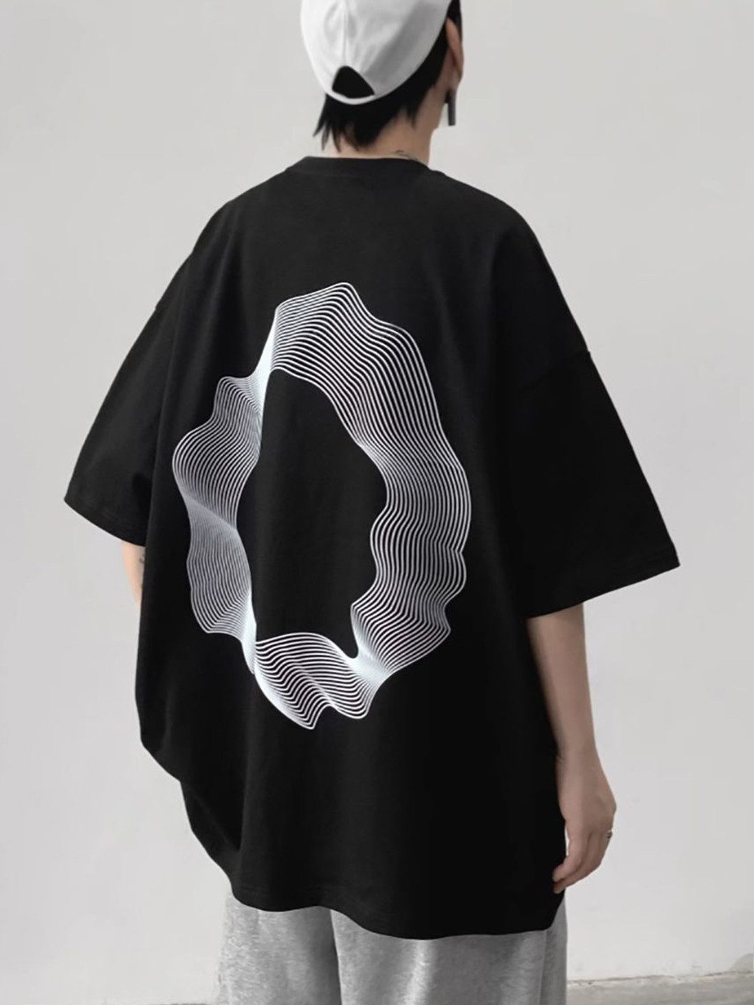 

StyleCast x Revolte Men Graphic Printed Round Neck Oversized T-shirt, Black
