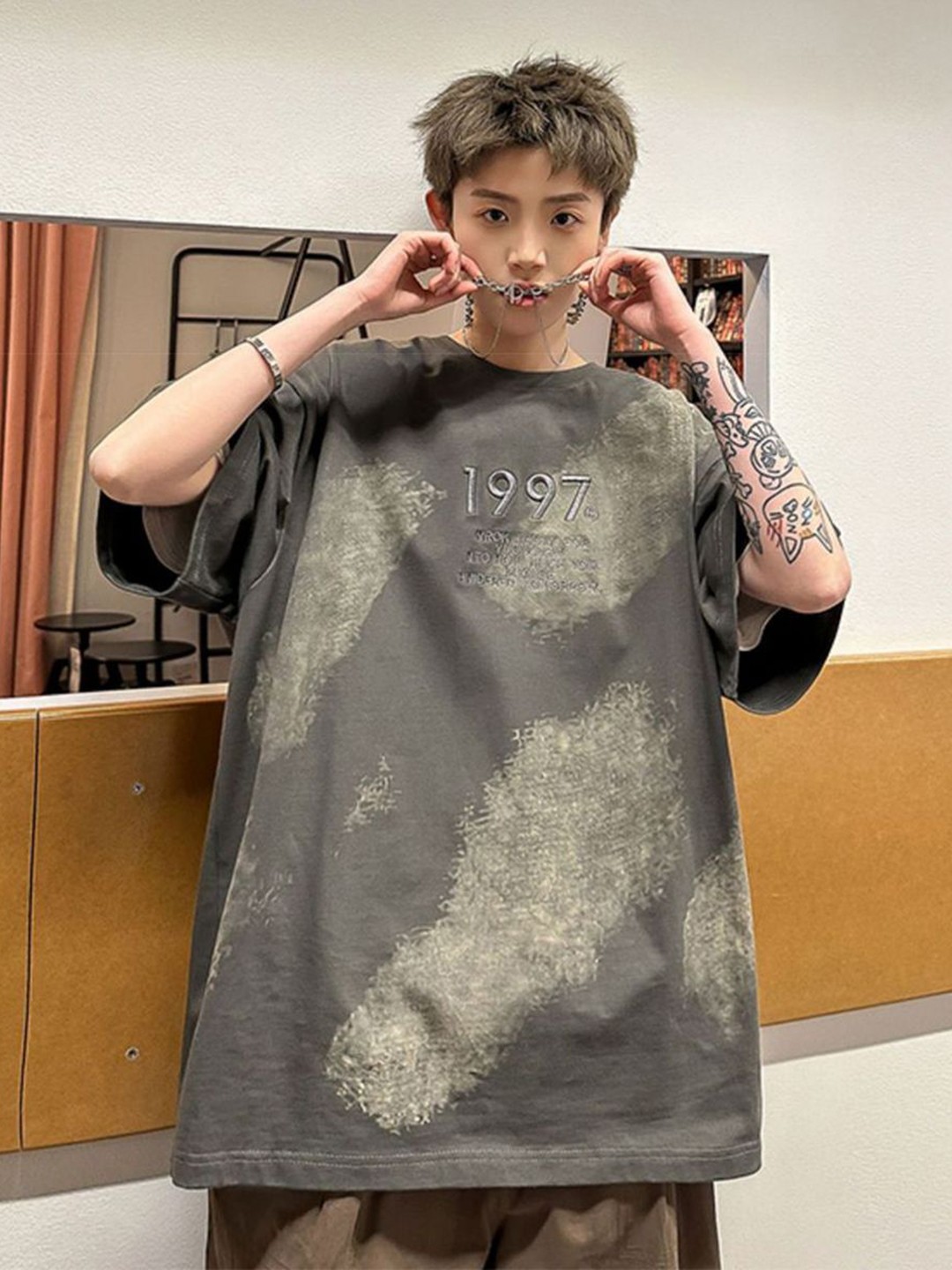 

StyleCast x Revolte Men Abstract Printed Round Neck Cotton Oversized T-shirt, Grey