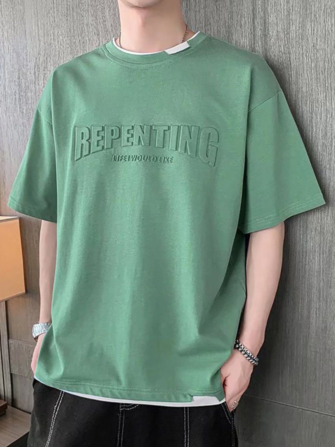 

StyleCast x Revolte Men Typography Printed Round Neck T-shirt, Green