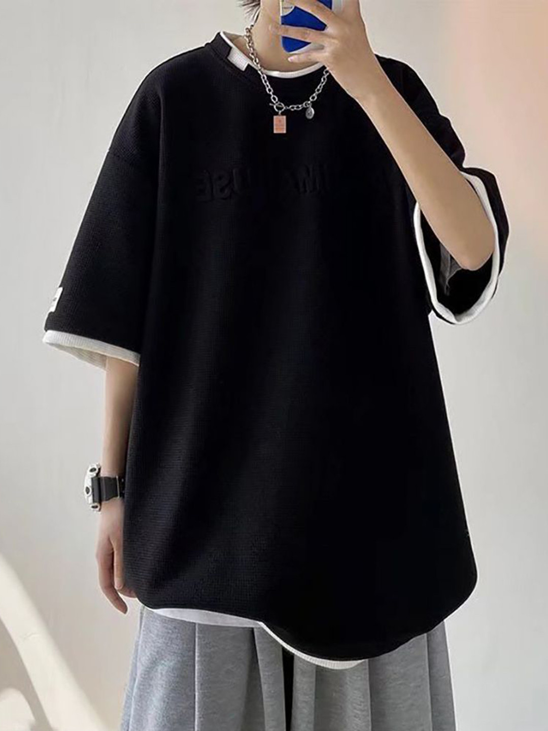 

StyleCast x Revolte Men Solid Round Neck Oversized T-shirt, Black