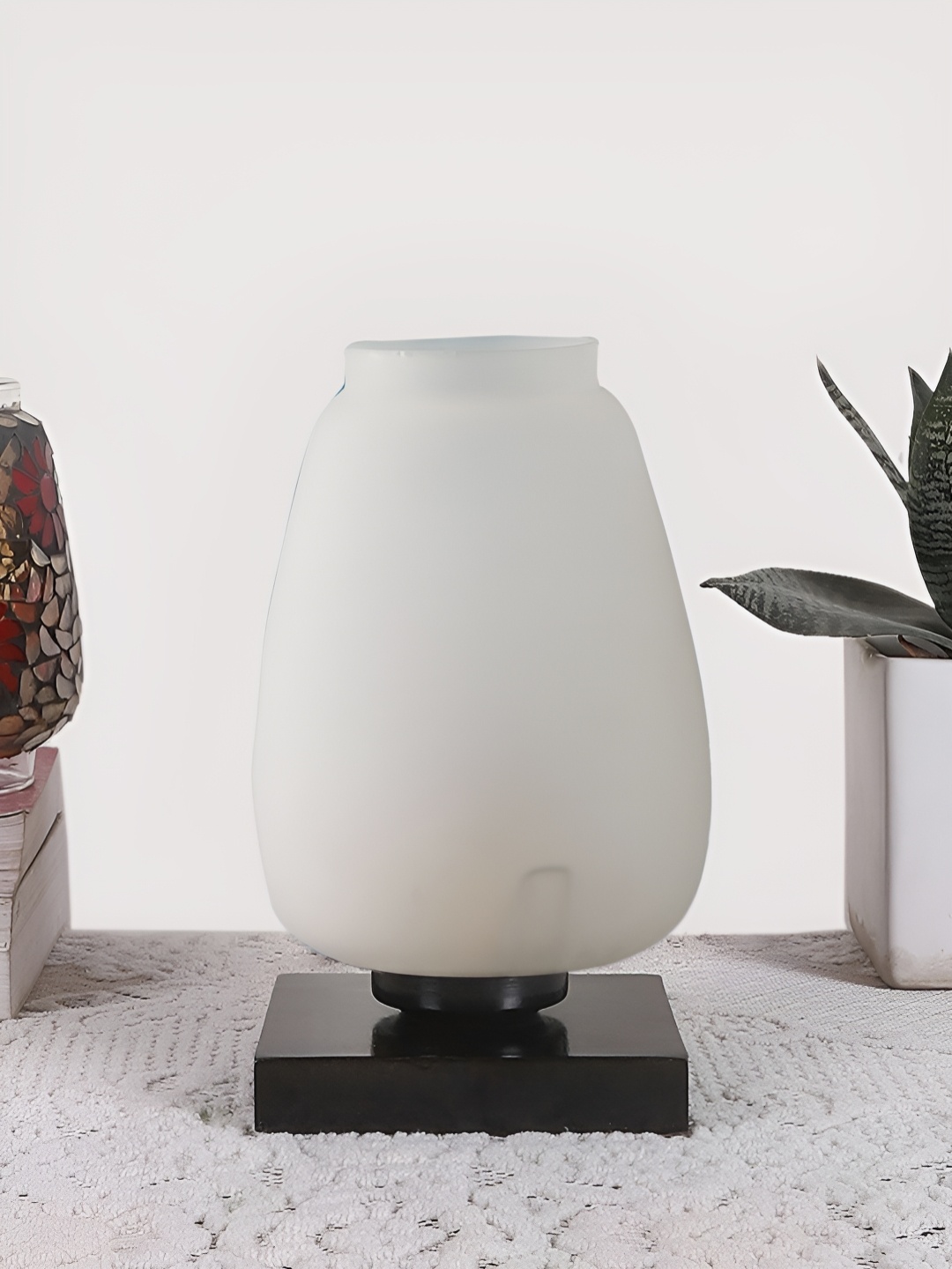 

Devansh White Glass Contemporary Abstract Shaped Table Lamp