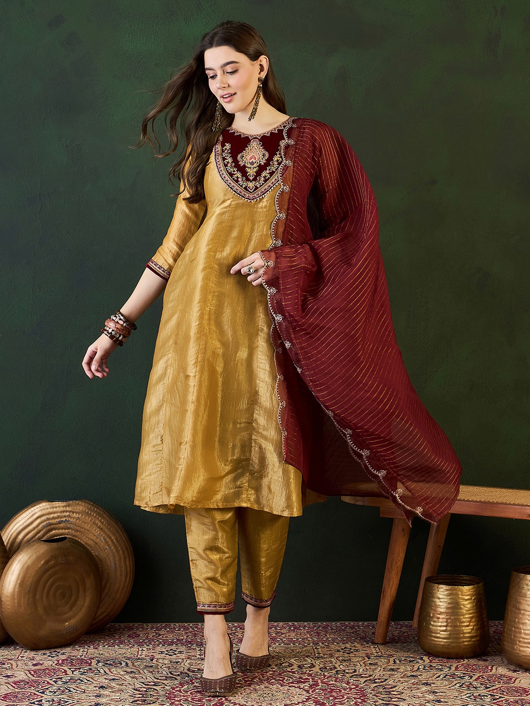 

Sangria Gold Ethnic Motifs Embroidered Thread Work A-Line Kurta With Trousers And Dupatta