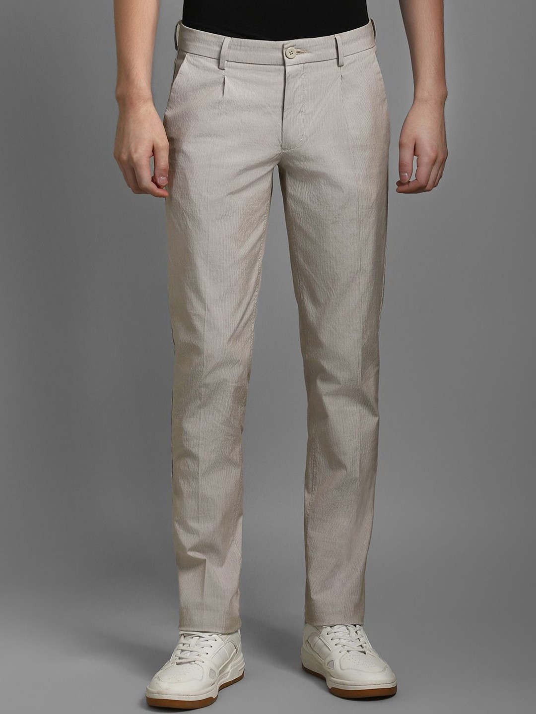 

Louis Philippe Sport Men Cotton Self Design Slim Fit Mid-Rise Pleated Trousers, Beige