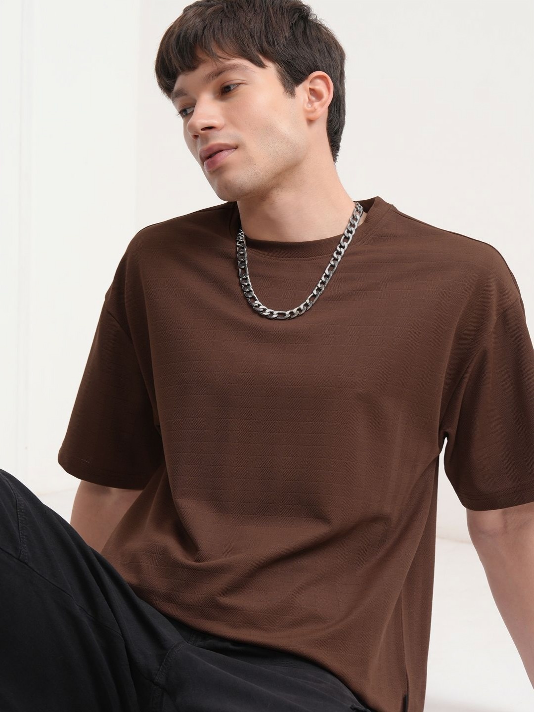 

HIGHLANDER Men Solid Round Neck Oversized T-shirt, Brown
