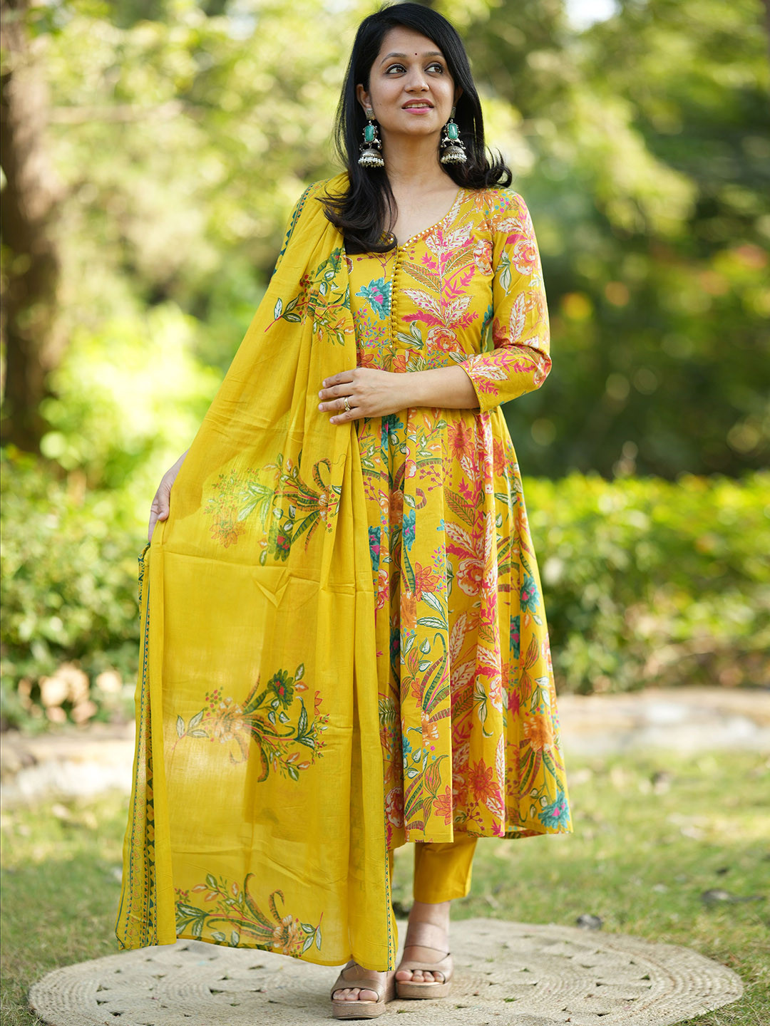 

Dholkee Floral Printed Pure Cotton Anarkali Kurta With Trousers And Dupatta, Mustard