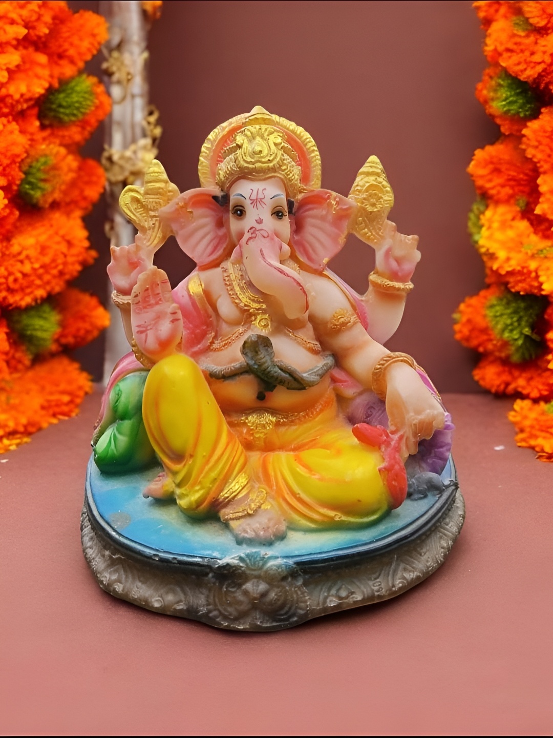 

Vrinban International Yellow & Gold-Toned Lord Ganesha Religious Idol Showpiece