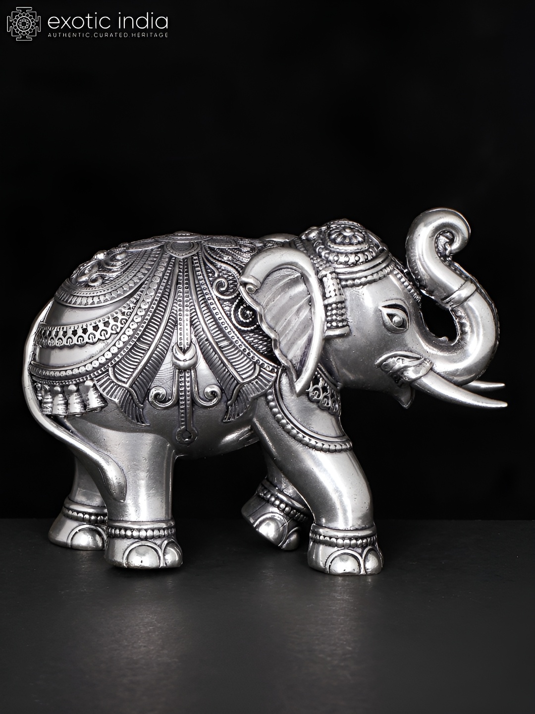 

Exotic India Silver-Toned Royal Elephant Brass Religious Figurine Showpiece