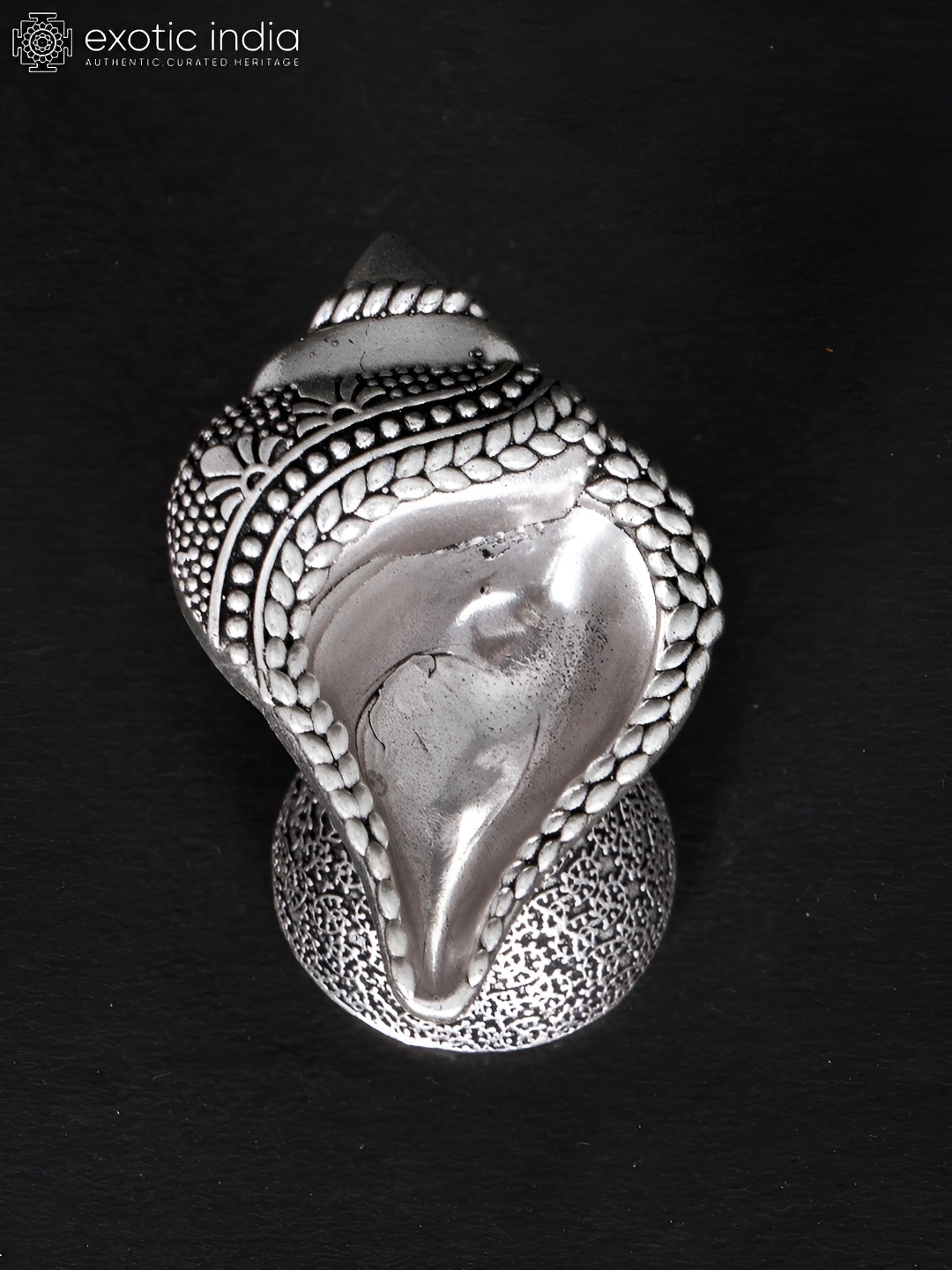 

Exotic India Silver-Toned Conch Shape Brass Religious Figurine Showpiece