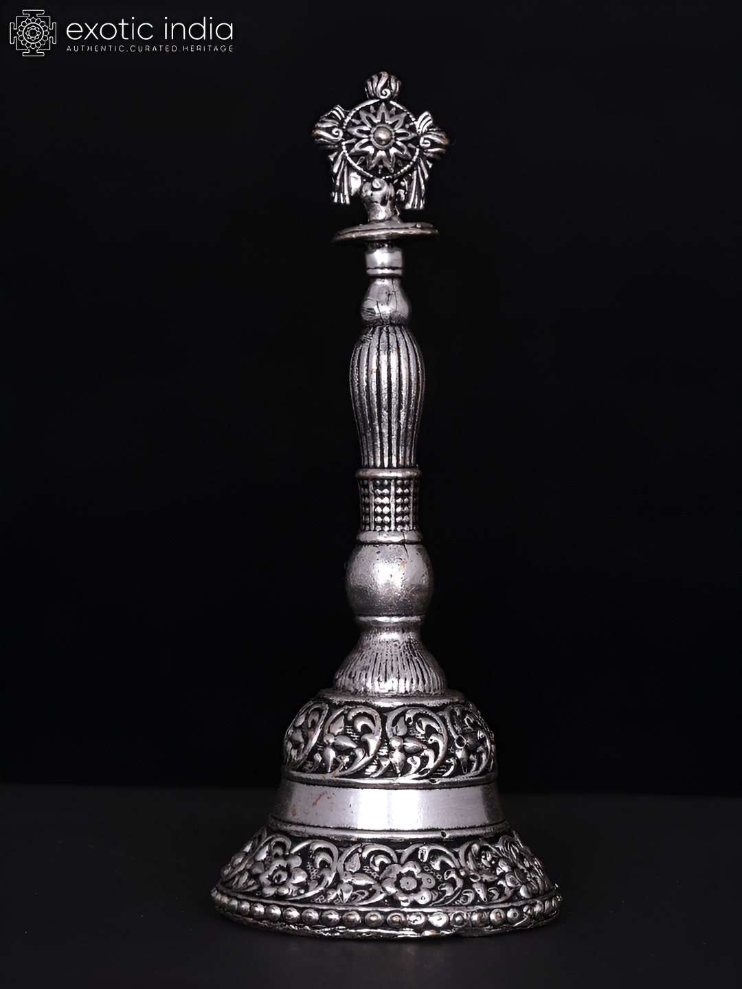 

Exotic India Silver-Toned Vaishnava Chakra Bell Silver Plating Brass Curio Showpiece