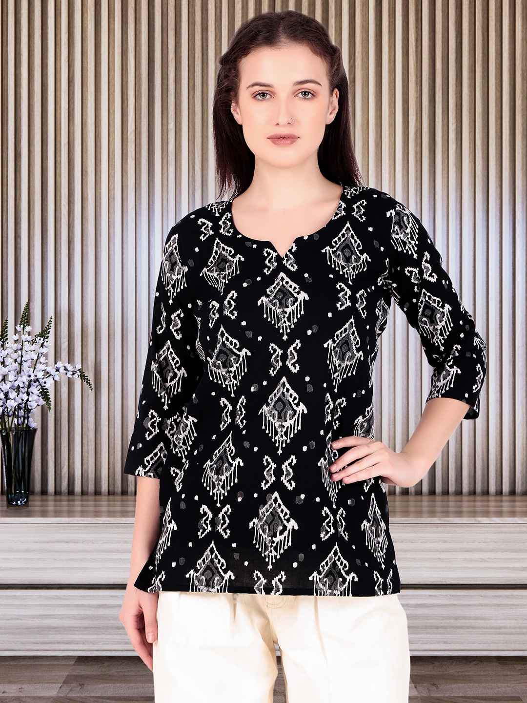 

Magnetism Jaipuri traditional ikkat printed black short kurti with detachable linning