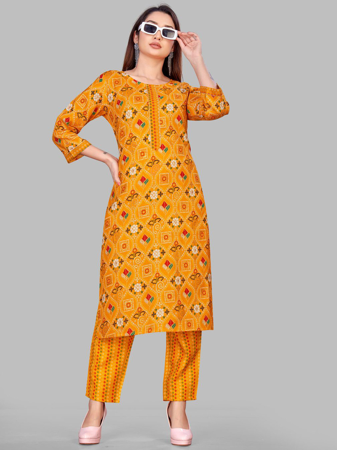 

Krimmple Bandhani Printed Gotta Patti Straight Kurta With Pyjamas, Yellow