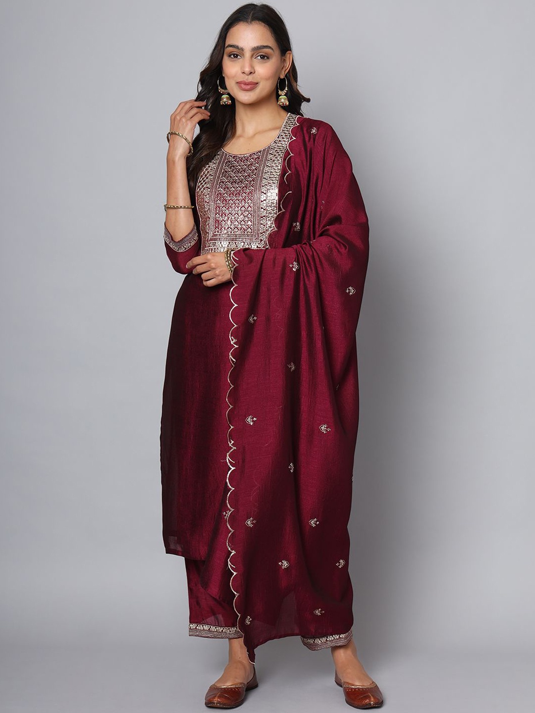 

Krimmple Gotta Patti Embellished Round Neck A-Line Kurta with Trousers And Dupatta, Maroon