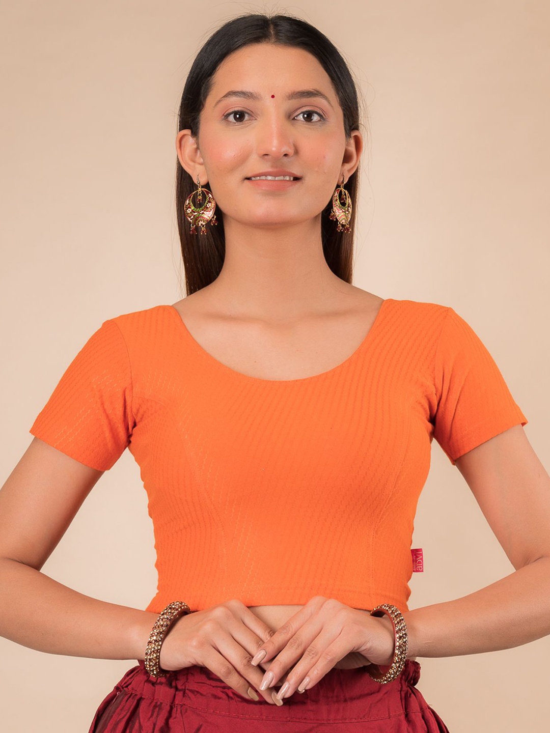 

Bindigasm's Advi Self Designed Texture Cotton Stretchable Slip On Saree Blouse, Orange