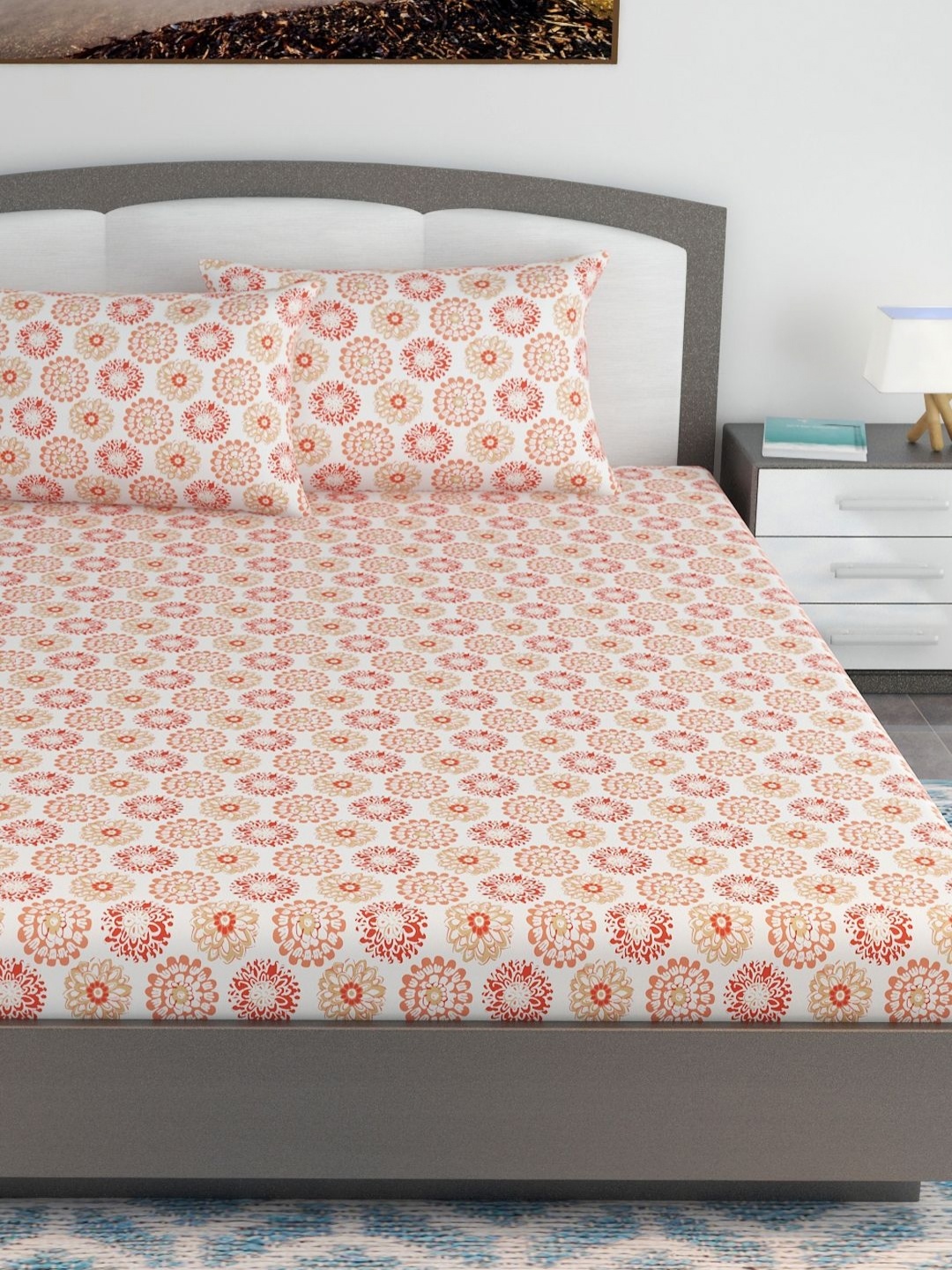 

Divine Casa Prism Peach & White Floral Pure Cotton 144 TC King Bedsheet Set- 1.85 m X 2 m