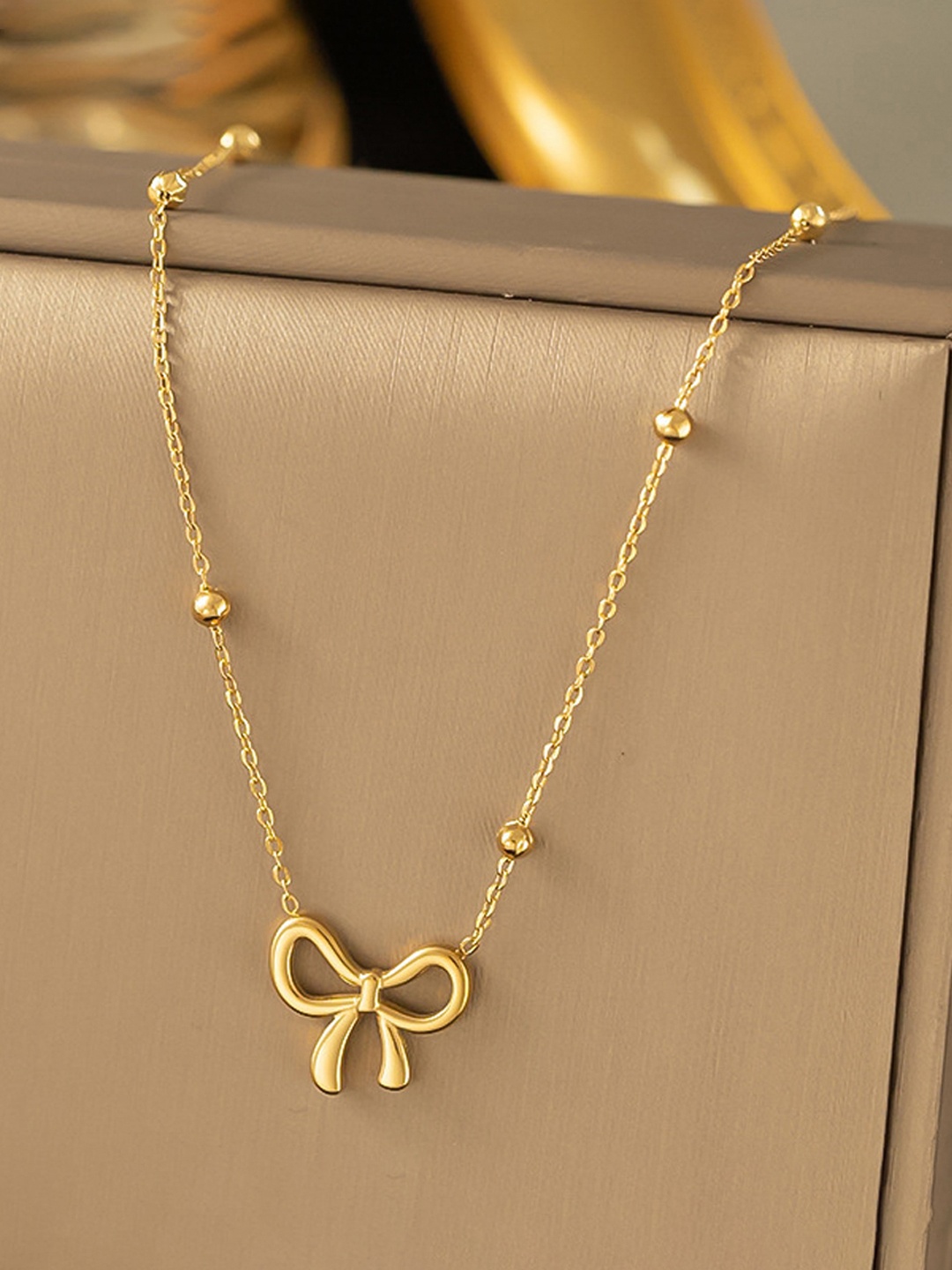 

Designs & You Gold-Plated Bow Necklace