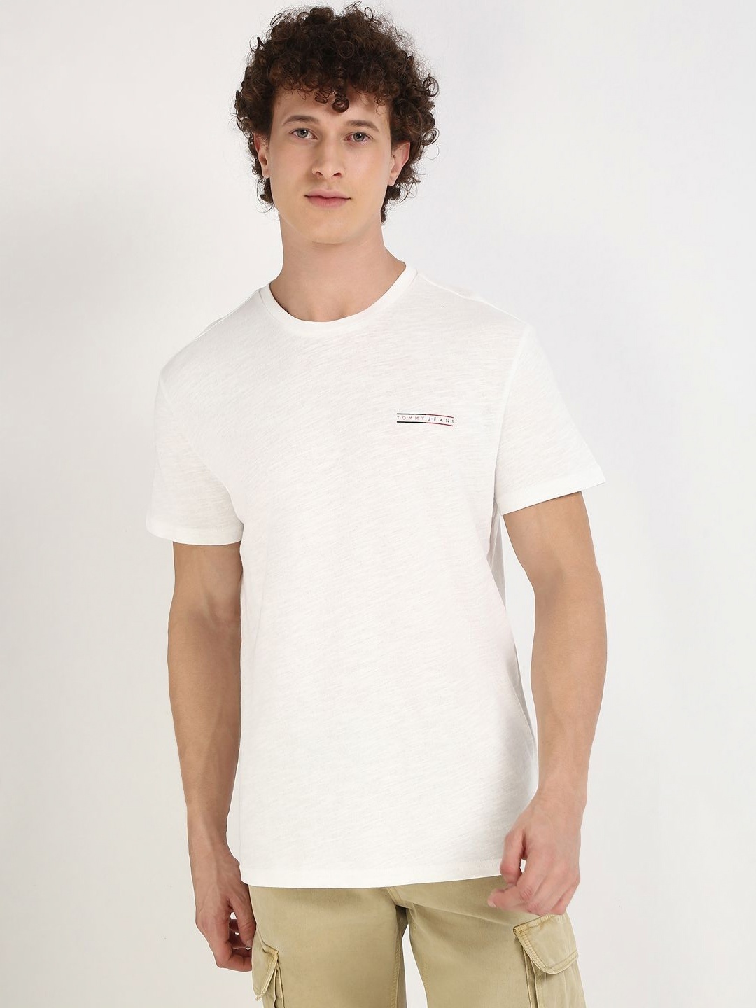 

Tommy Hilfiger Men Solid Round Neck Cotton T-shirt, White