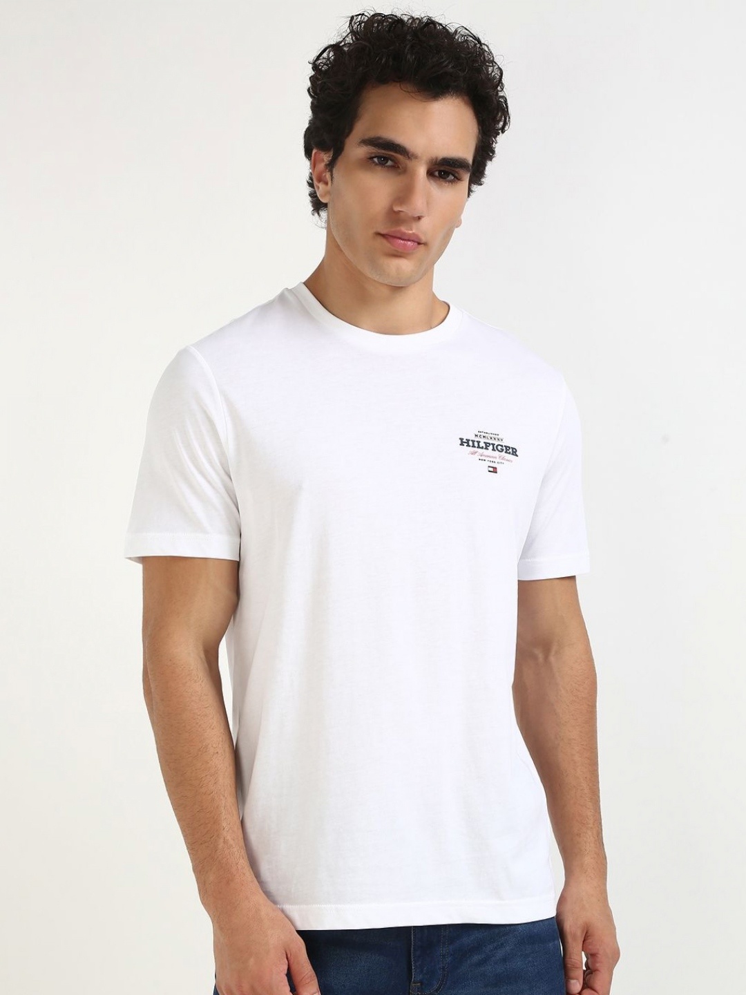 

Tommy Hilfiger Men Solid Round Neck Cotton T-shirt, White