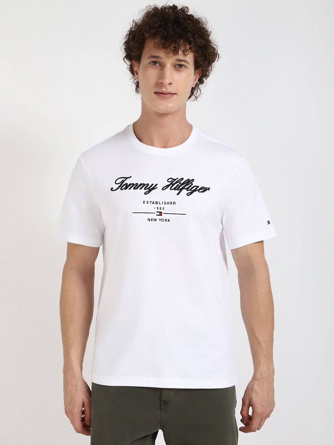 

Tommy Hilfiger Men Solid Round Neck Cotton T-shirt, White