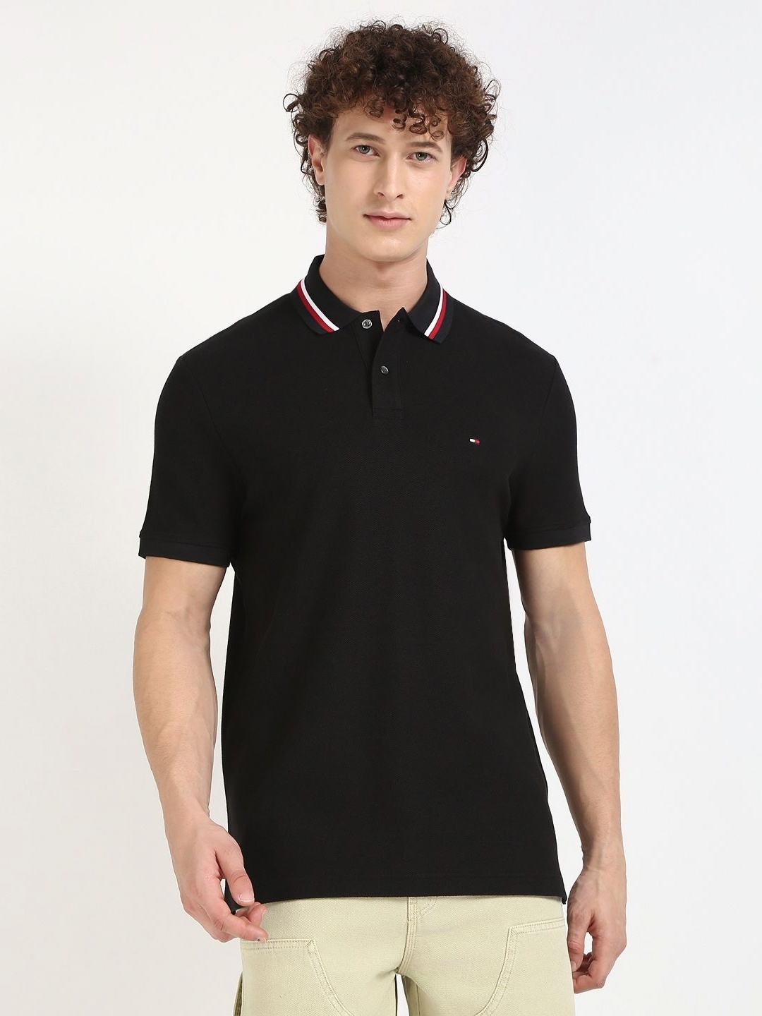 

Tommy Hilfiger Men Solid Polo Collar Cotton T-shirt, Black