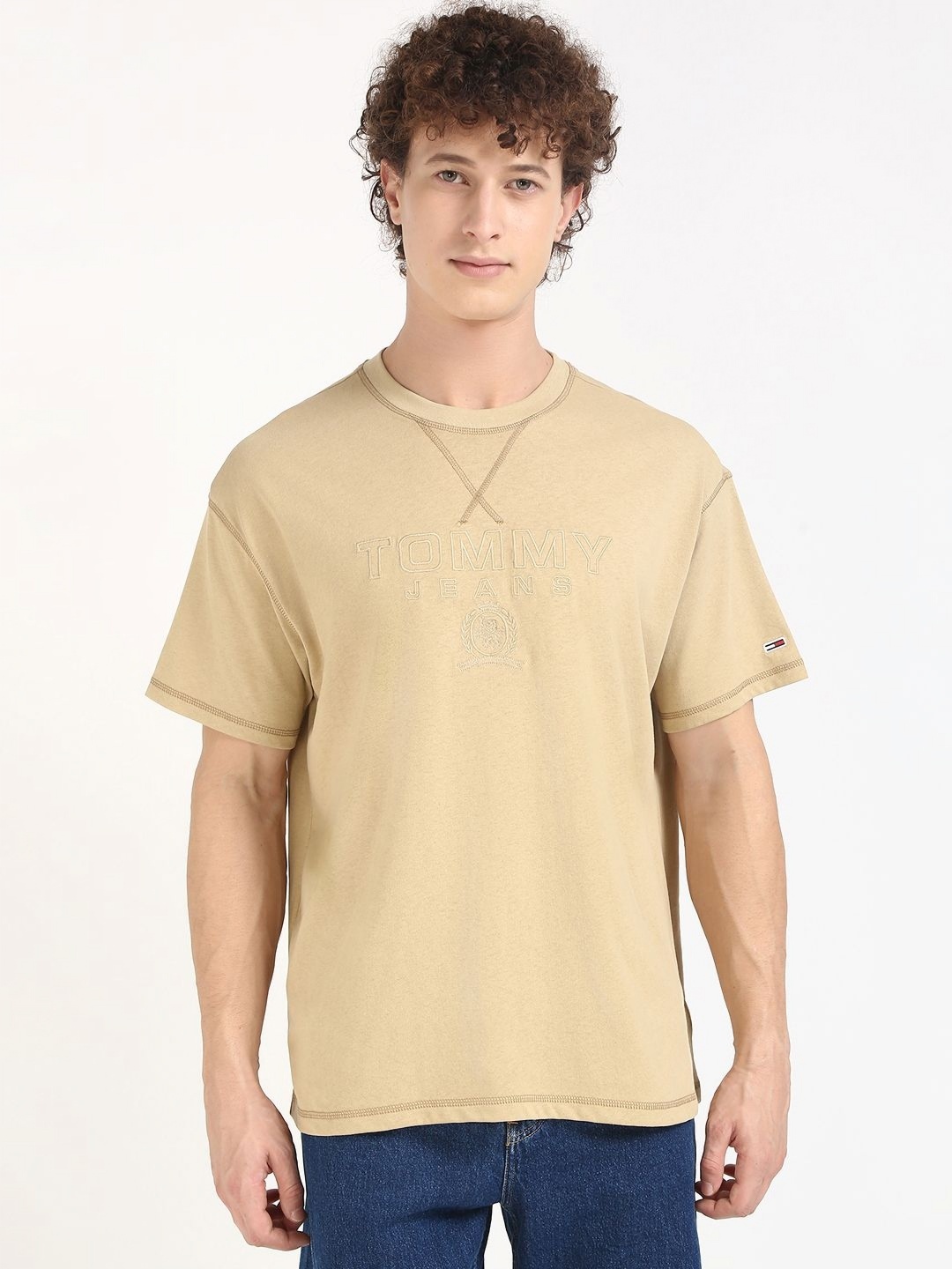 

Tommy Hilfiger Men Solid Round Neck Cotton T-shirt, Beige
