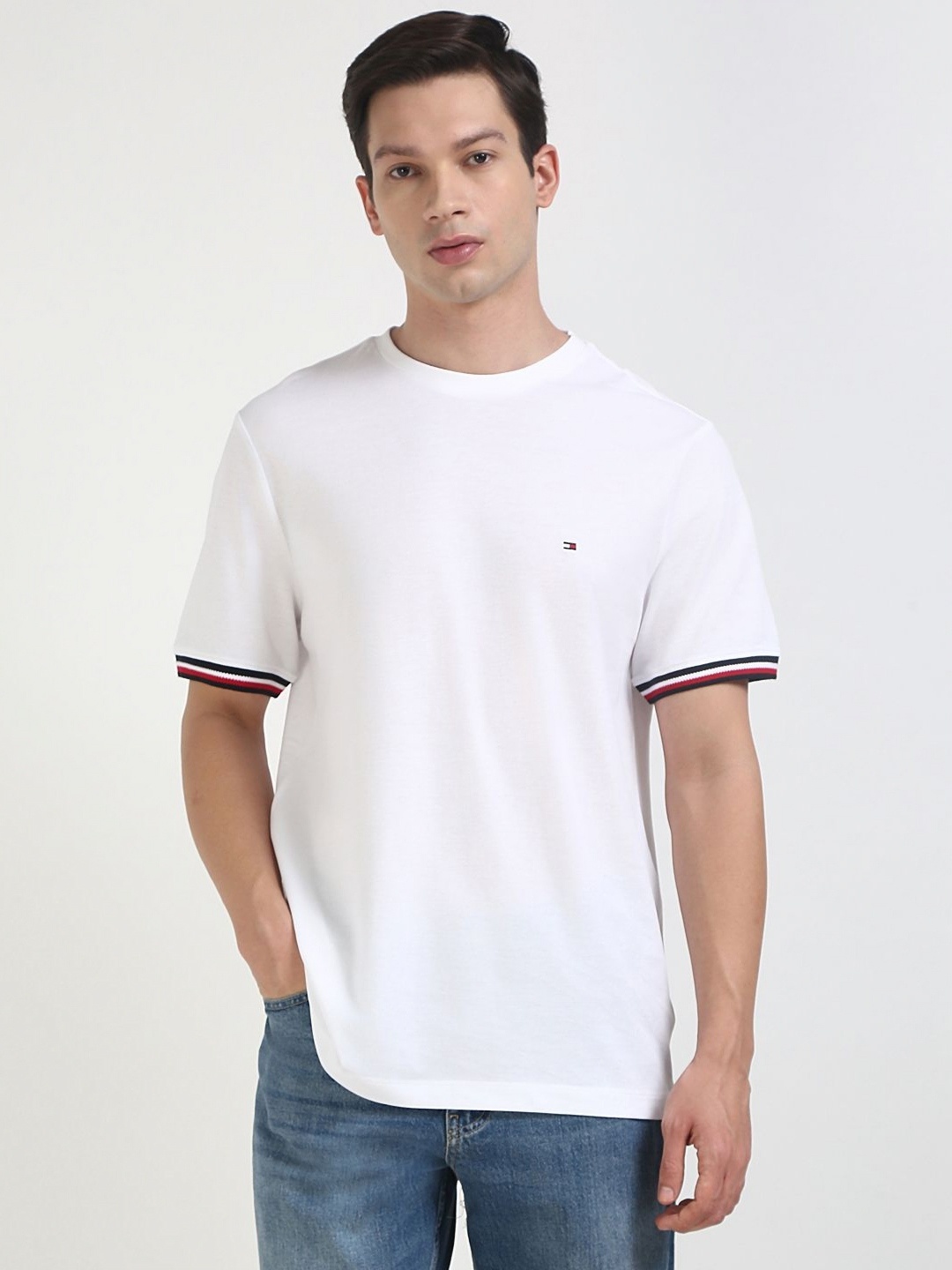 

Tommy Hilfiger Men Solid Round Neck Cotton T-shirt, White