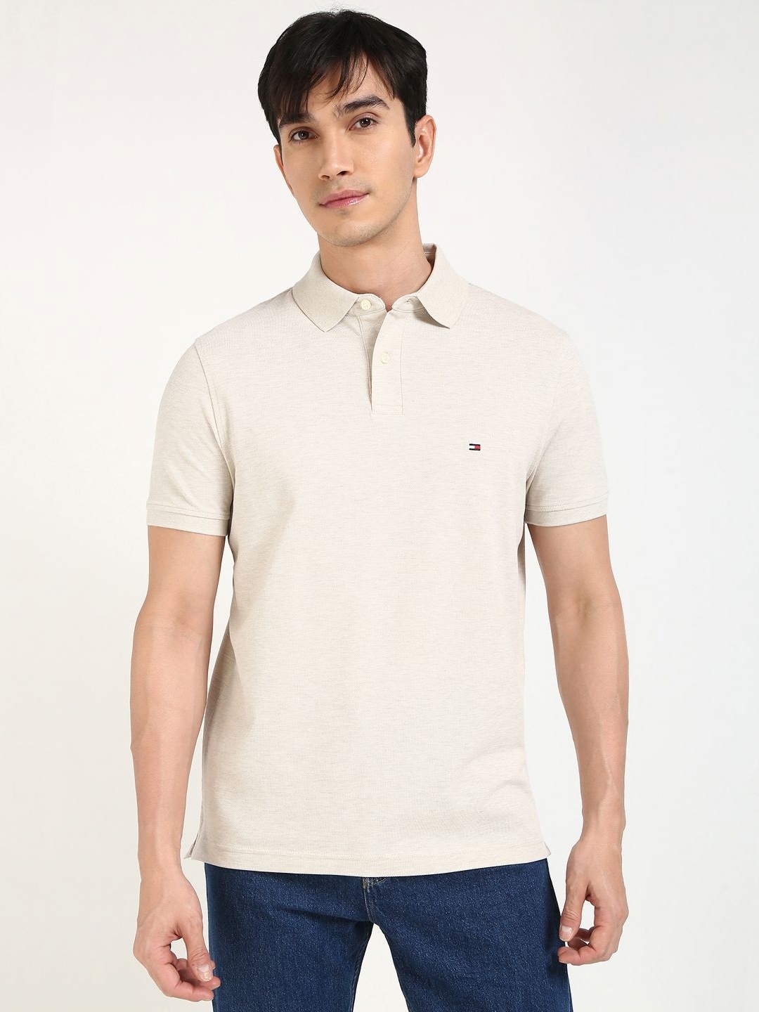 

Tommy Hilfiger Men Solid Polo Collar Cotton T-shirt, Off white