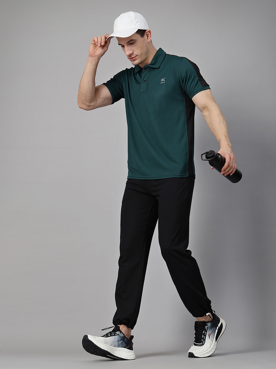 

HRX by Hrithik Roshan Men Solid Polo Collar T-shirt, Green