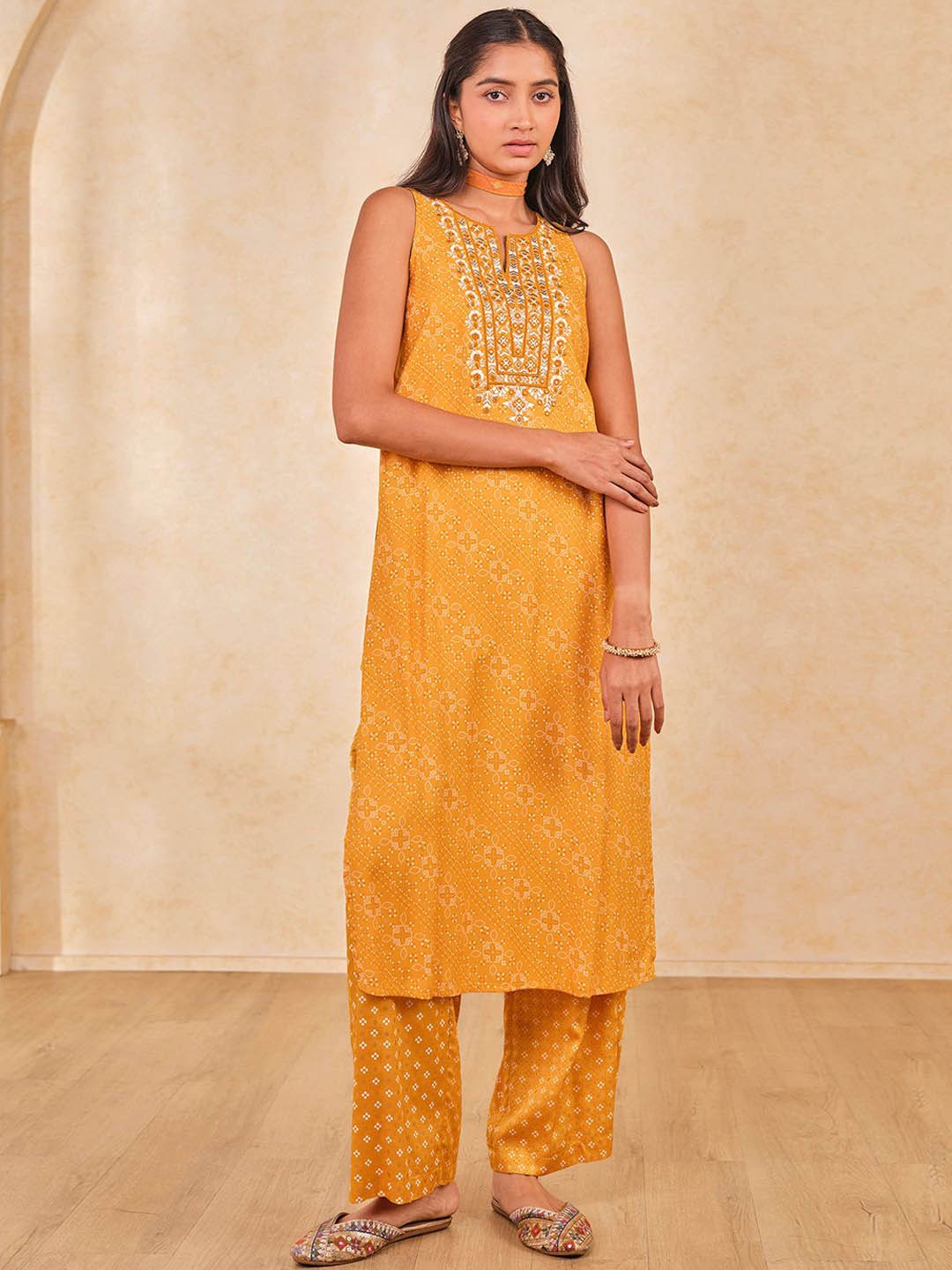 

Global Desi Bandhani Printed Notch Neck Thread Work Straight Kurta With Palazzos, Mustard