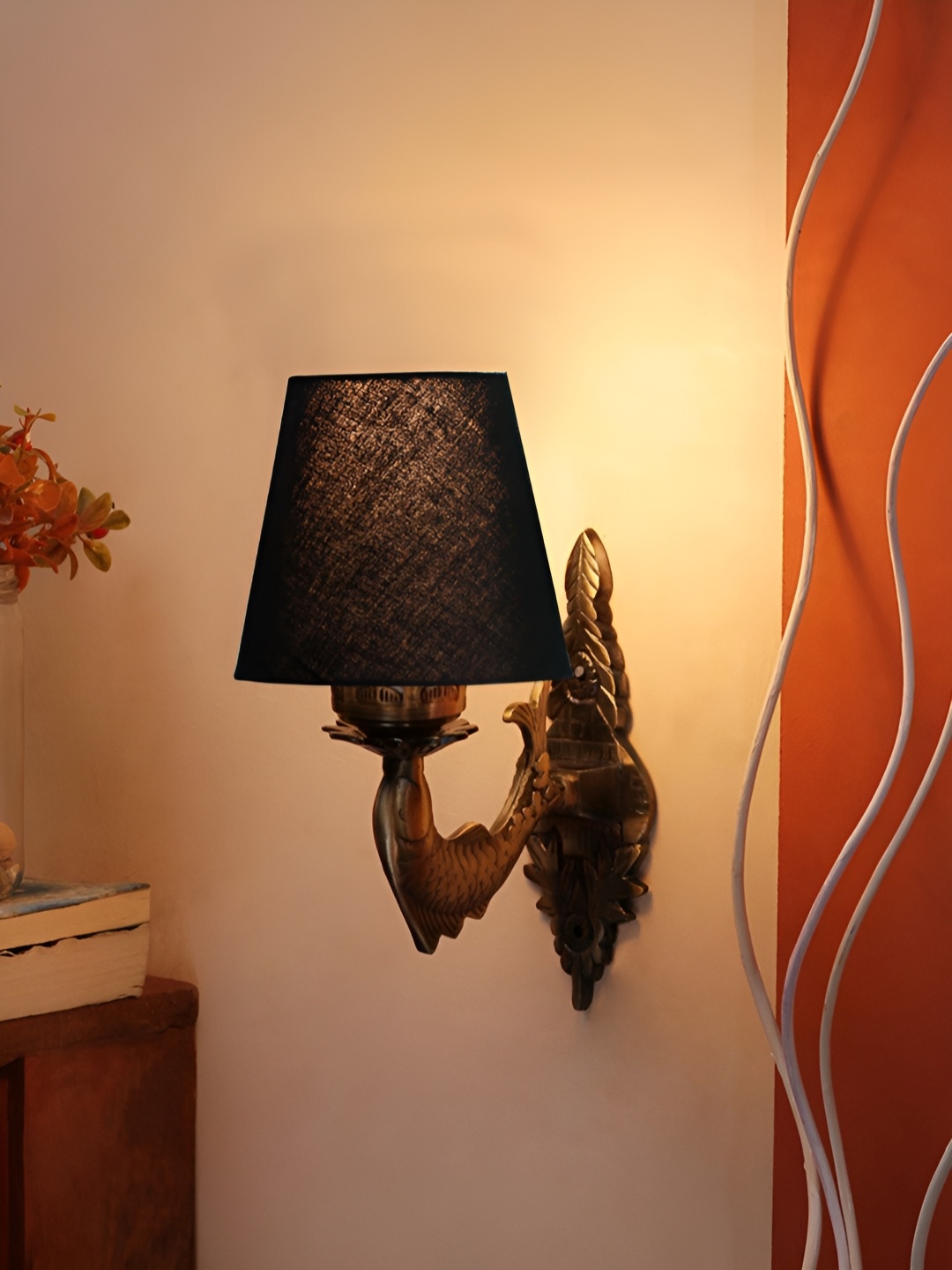 

Aura Black & Gold Toned Metal Traditional Cylinder Shaped Wall Lamp