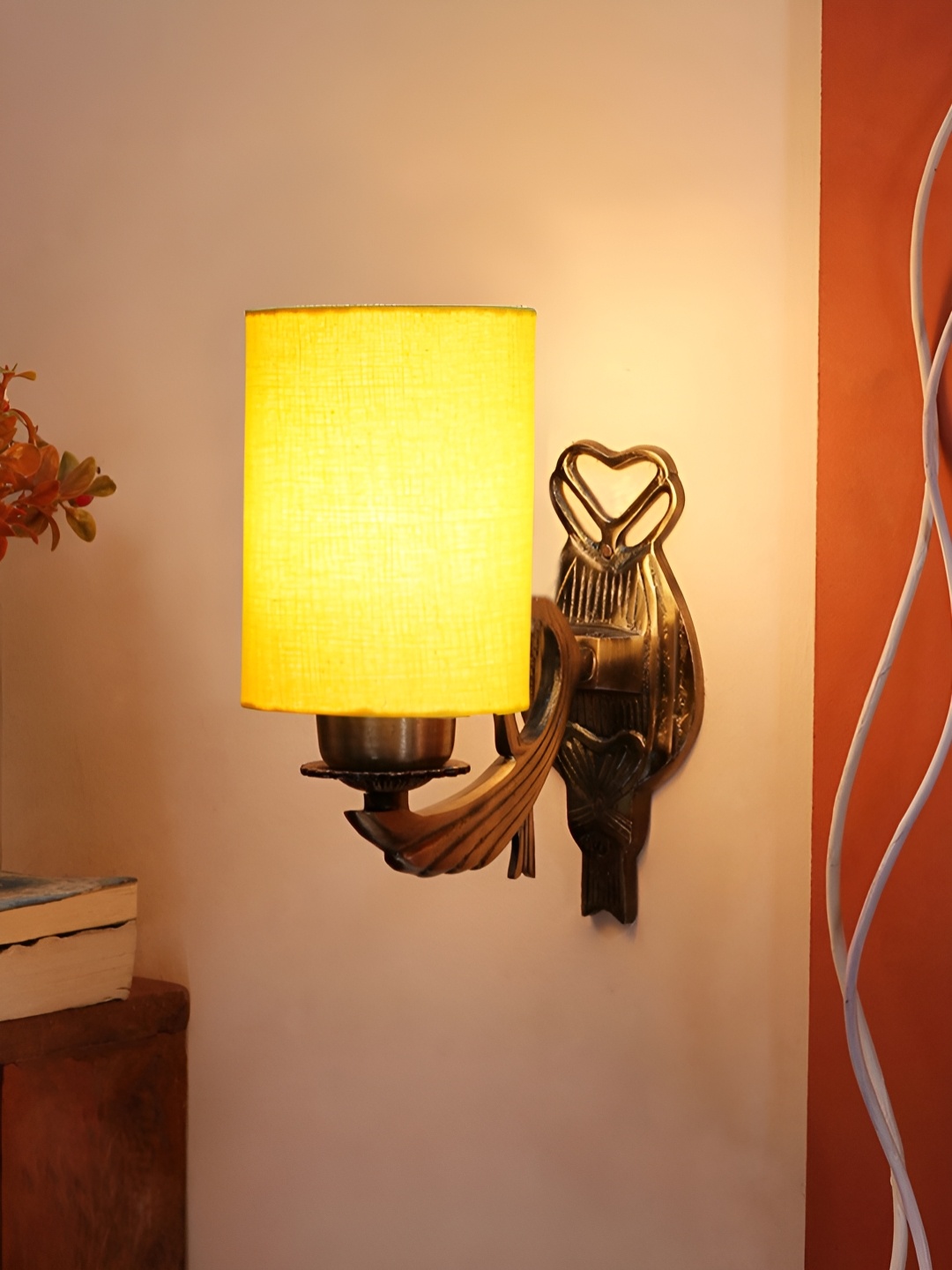 

Aura Yellow & Gold Toned Metal Traditional Cylinder Shaped Wall Lamp