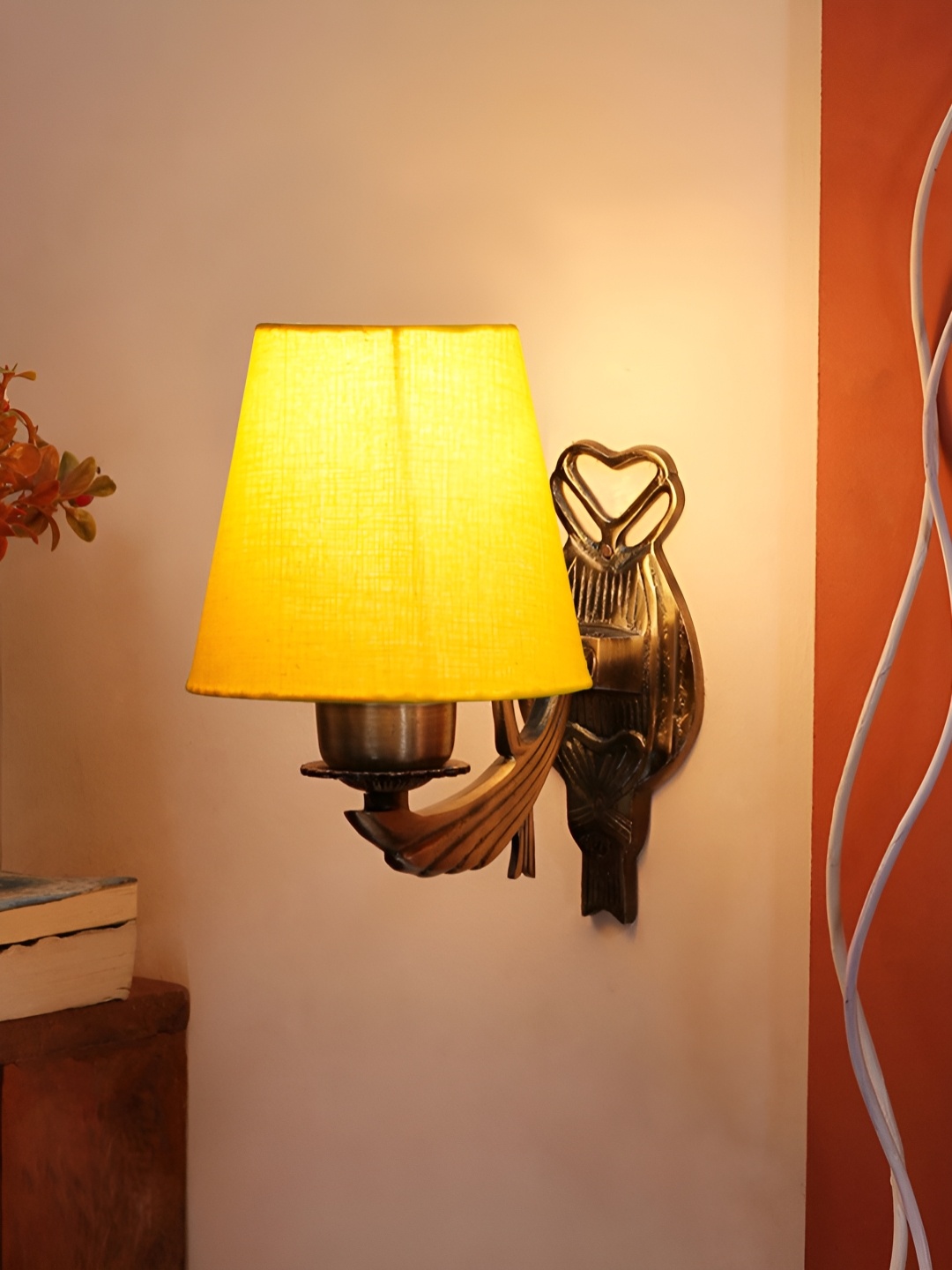 

Aura Yellow Metal Traditional Cylinder Shaped Wall Lamp