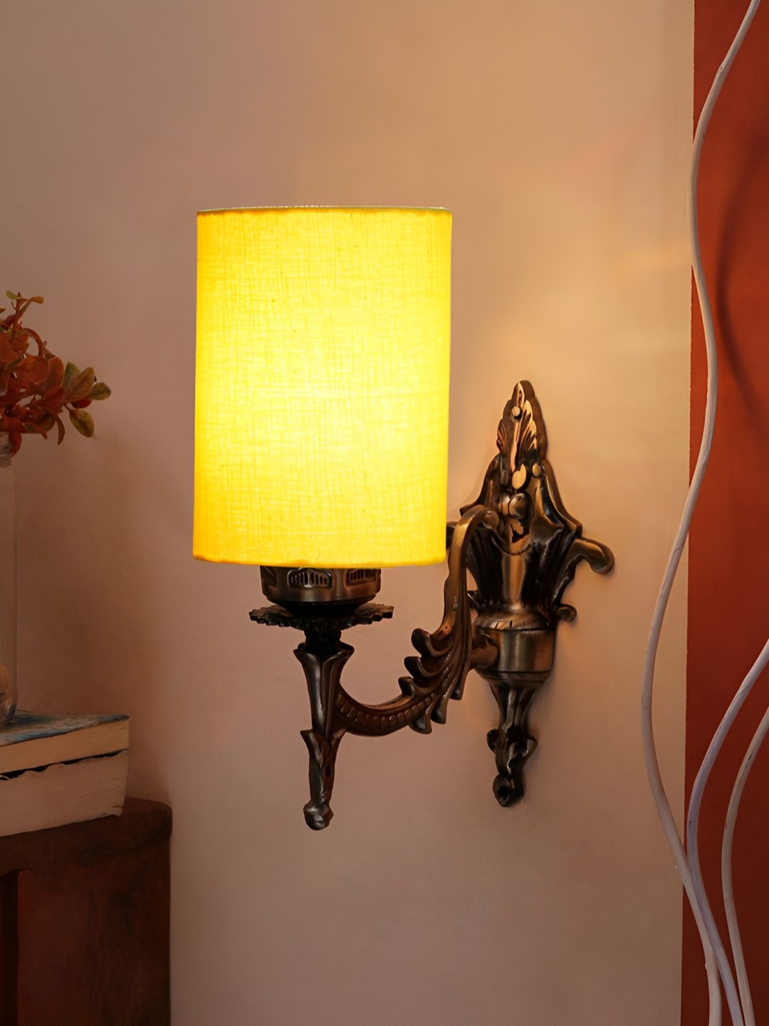 

Aura Yellow & Gold Toned Metal Cylinder Shaped Wall Lamp