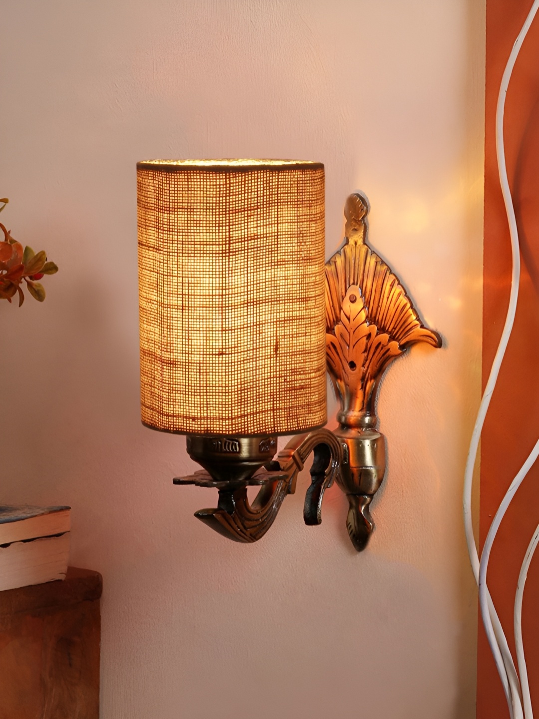 

Aura Devansh Beige & Bronze-Toned Textured Metal Traditional Cylinder Shaped Wall Lamp