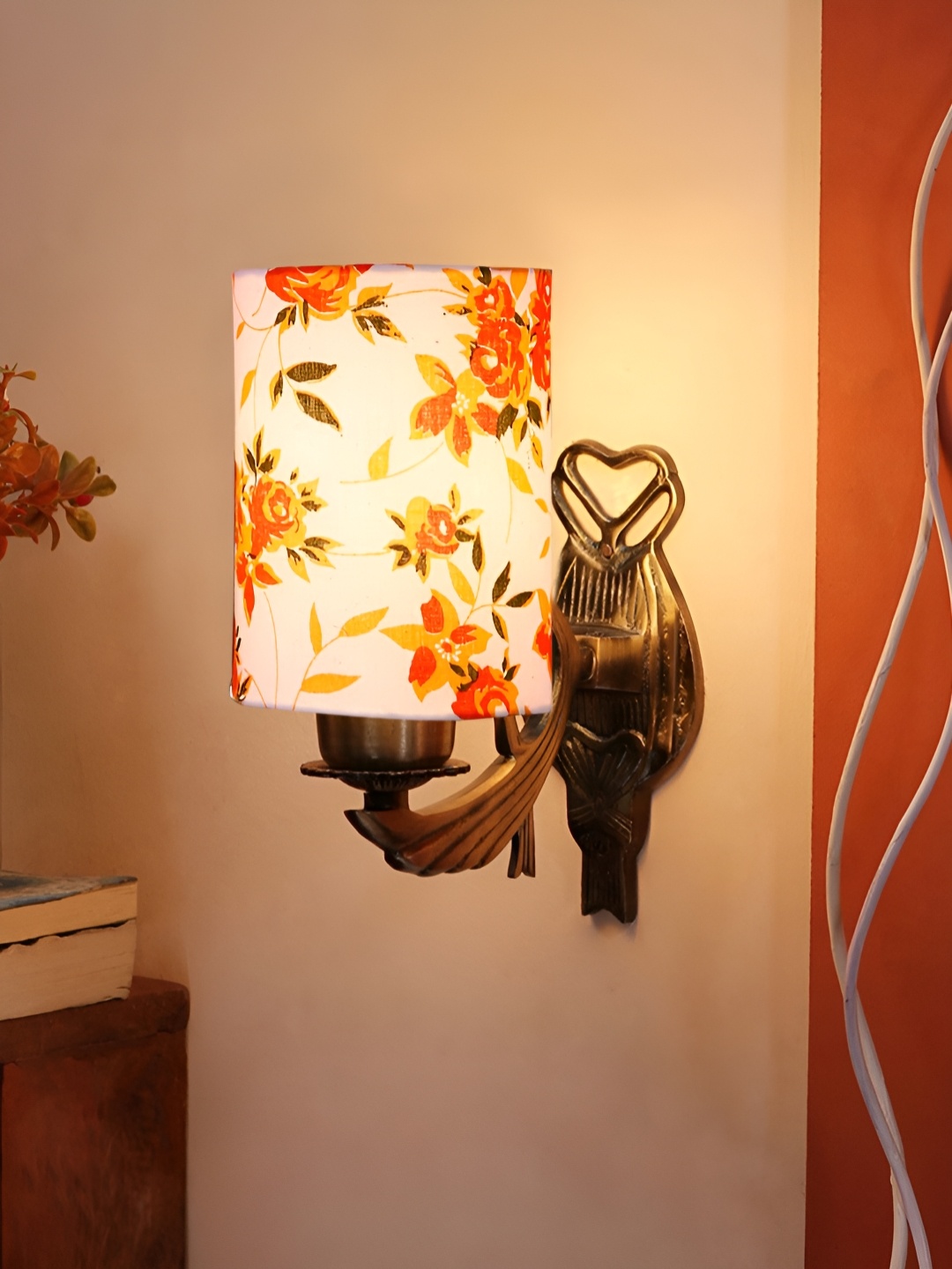 

Aura White & Orange-Coloured Floral Printed Cylinder Shaped Antique Metal Wall Lamp