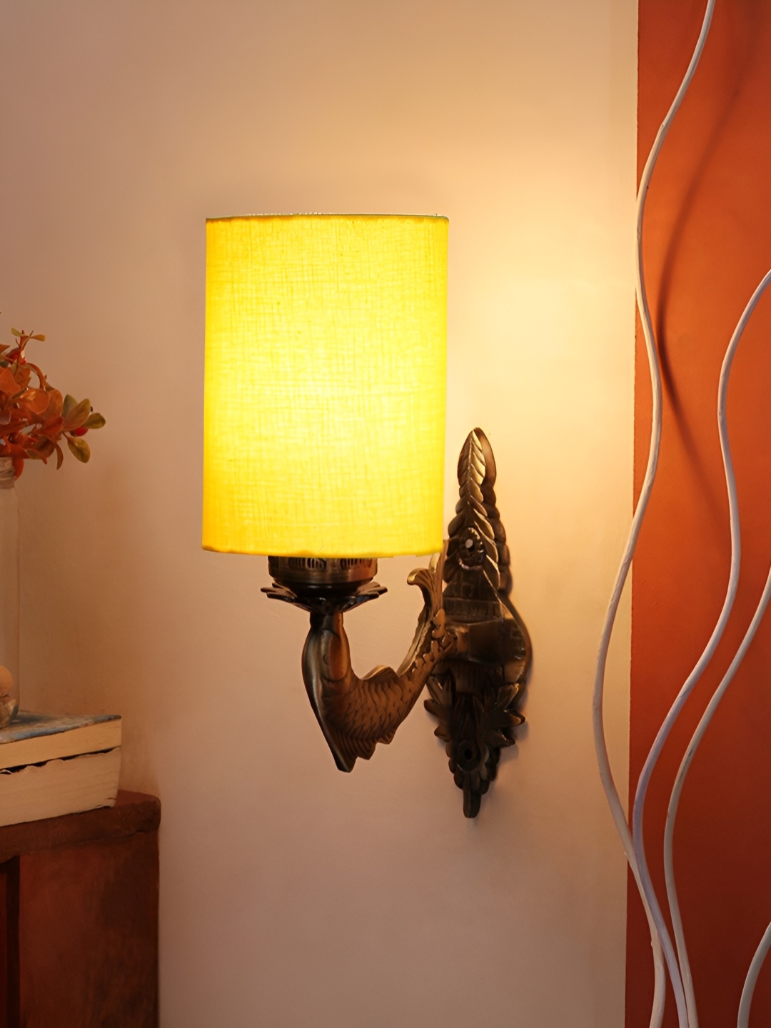 

Aura Yellow & Gold Toned Metal Cylinder Shaped Wall Lamp