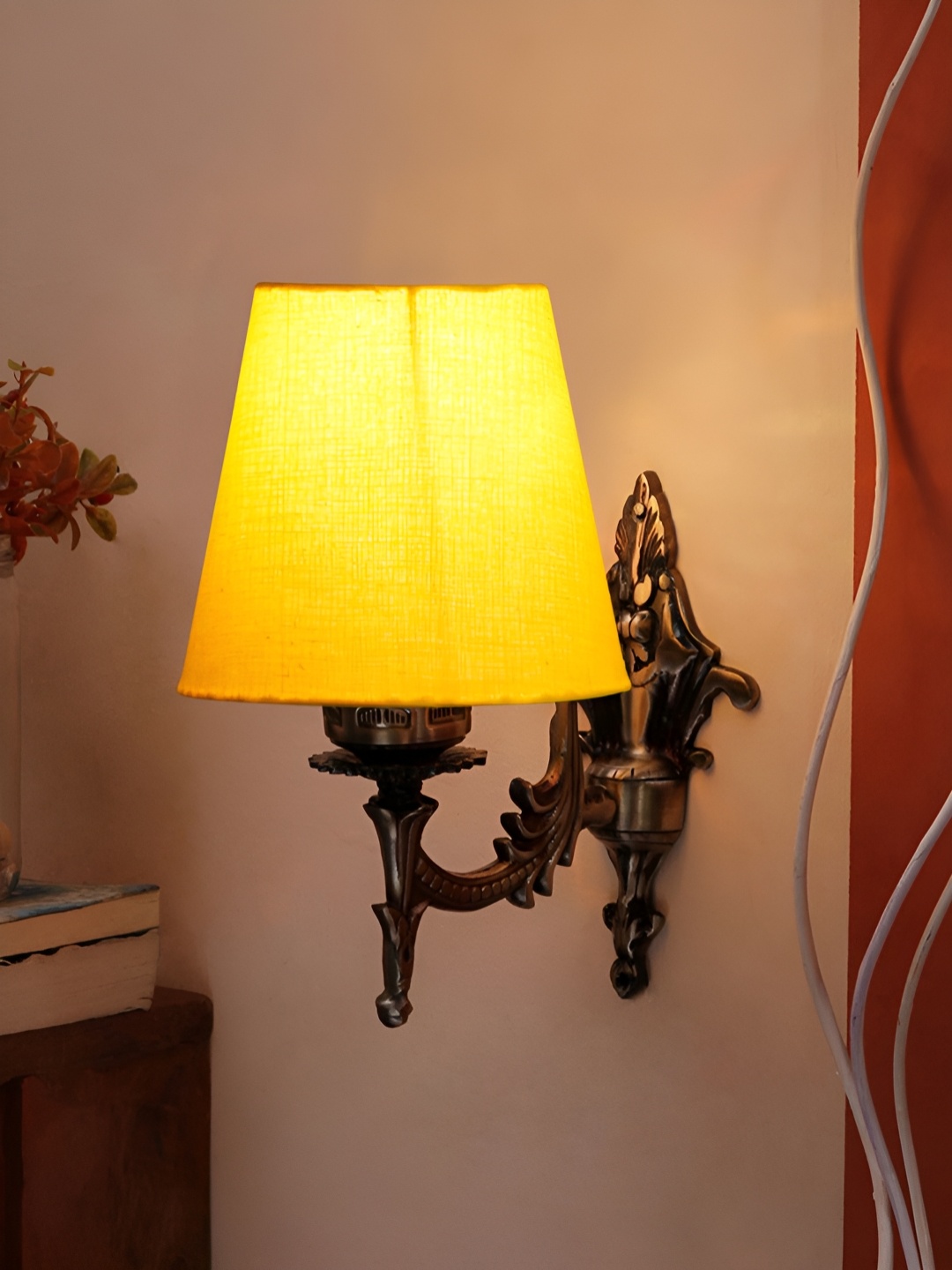

Aura Yellow Metal Traditional Cylinder Shaped Wall Lamp