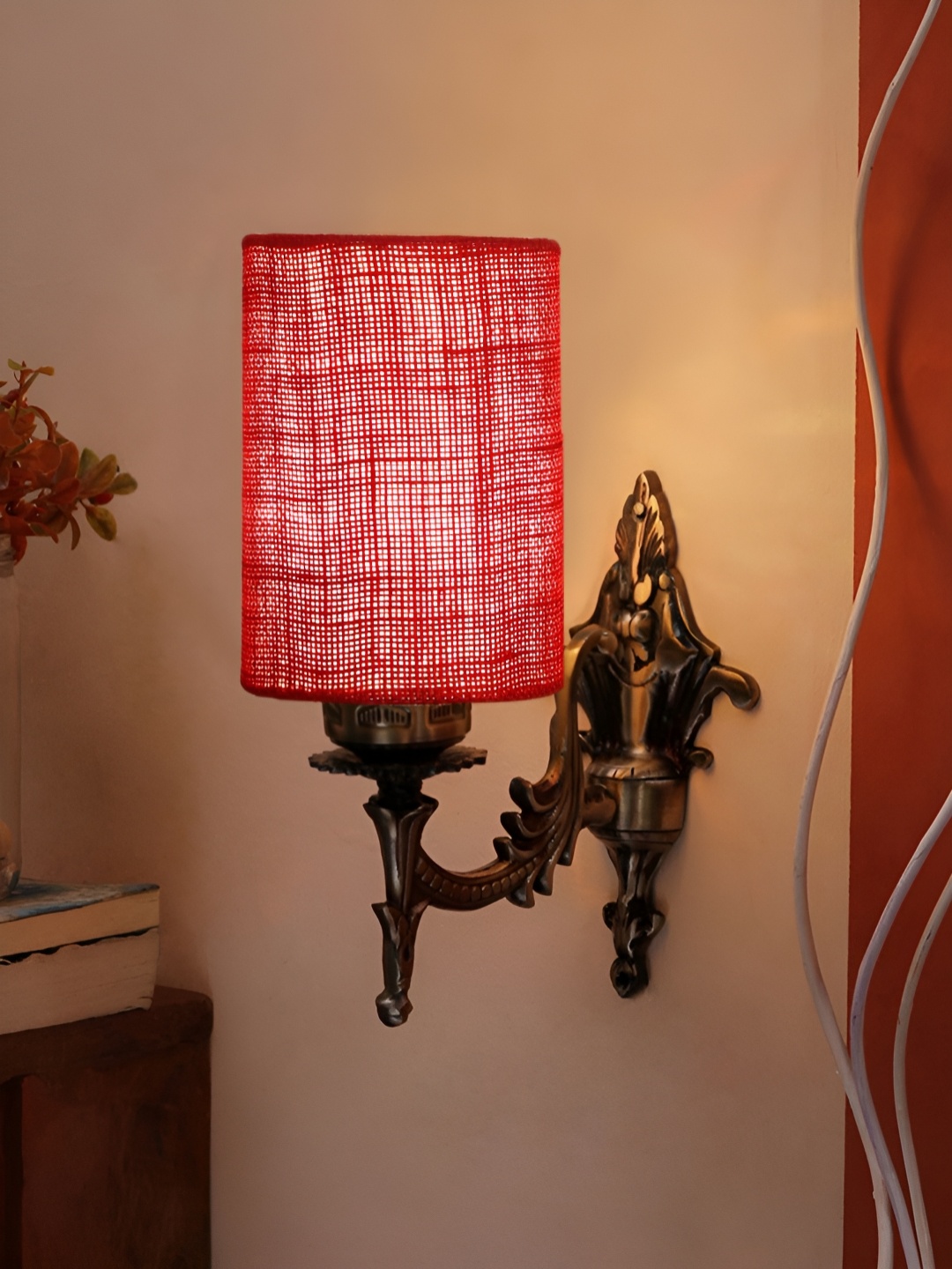 

Aura Maroon & Gold Toned Metal Cylinder Shaped Wall Lamp