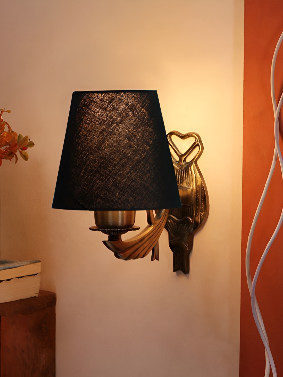 

Aura Black & Gold Toned Metal Frustum Shaped Wall Lamp