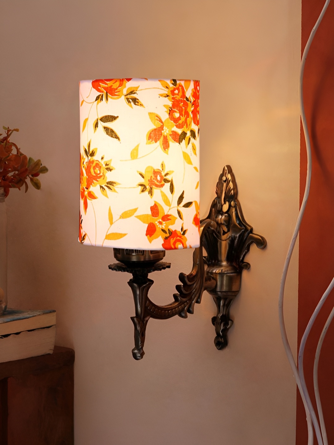 

Aura White & Orange-Coloured Floral Printed Cylinder Shaped Antique Metal Wall Lamp