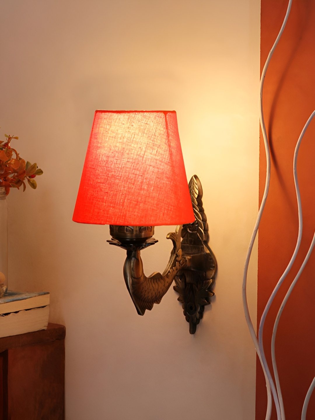 

Aura Devansh Orange & Bronze-Toned Metal Traditional Abstract Shaped Wall Lamp