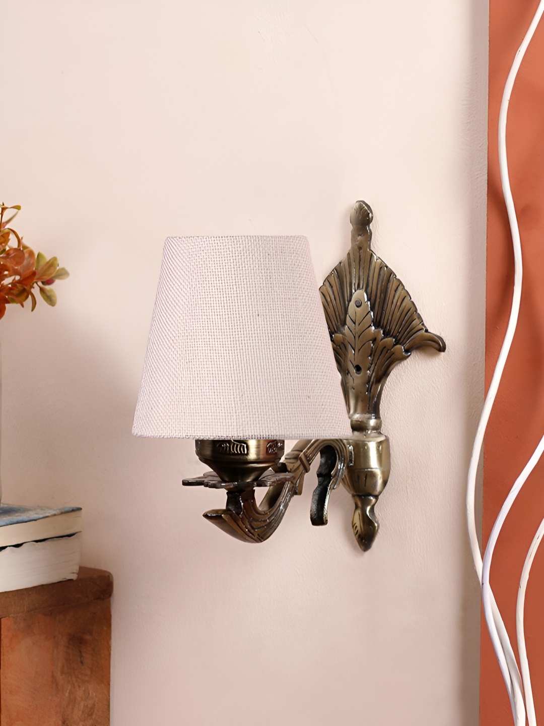 

Aura White & Gold Toned Metal Frustum Shaped Wall Lamp