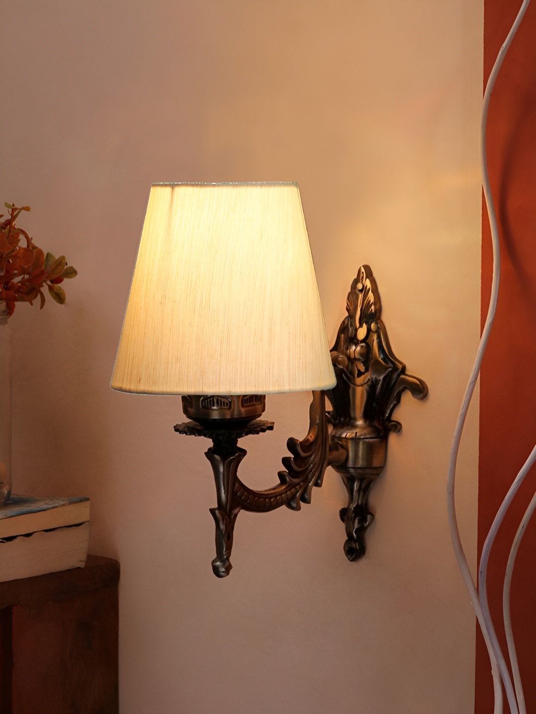 

Aura Off White & Brown Textured Metal Traditional Abstract Shaped Shaped Wall Lamp