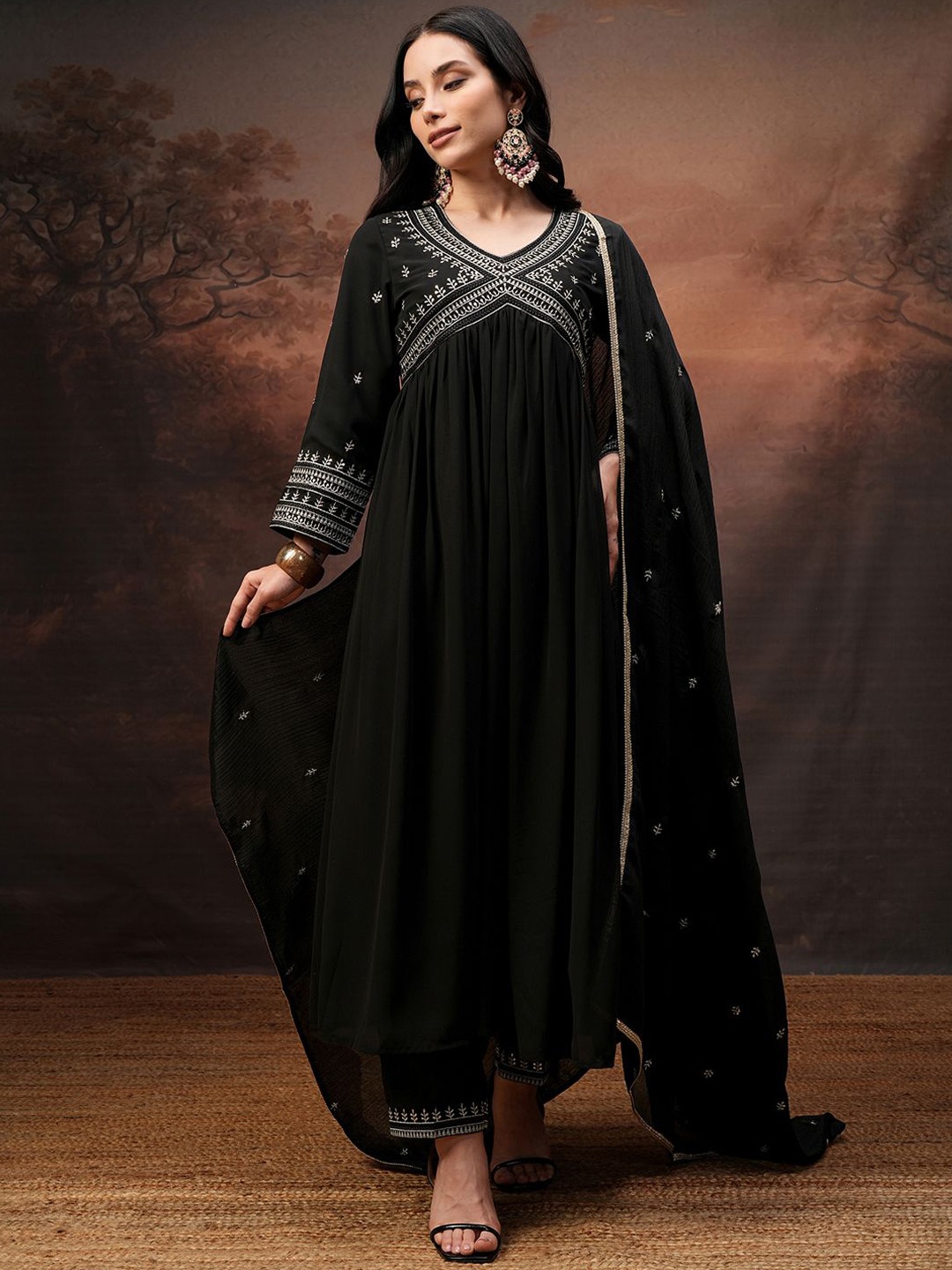 

Vishudh Ethnic Motifs Embroidered Sequinned V-Neck A-Line Kurta With Trouser And Dupatta, Black